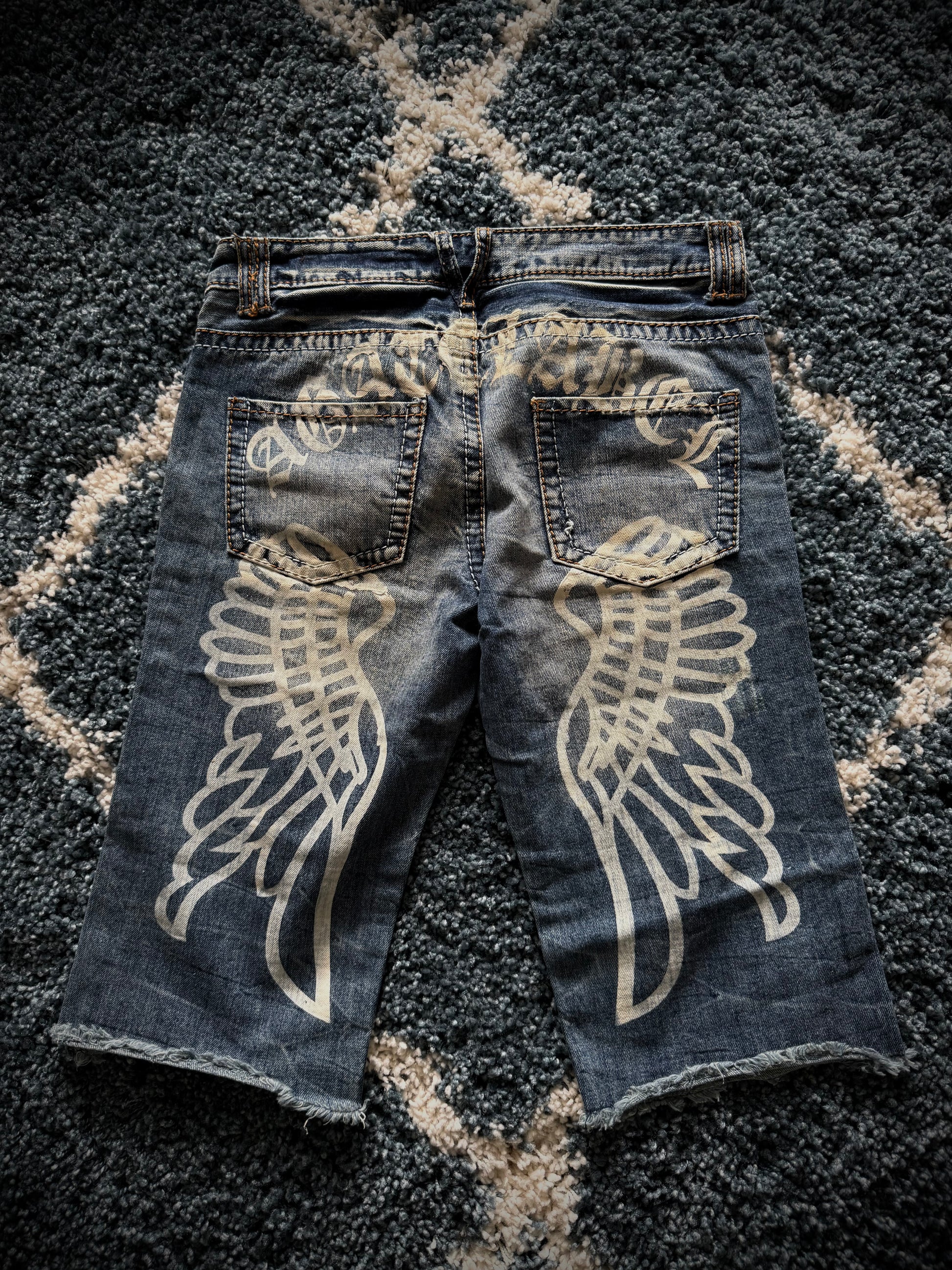 Agathe distressed wing shorts