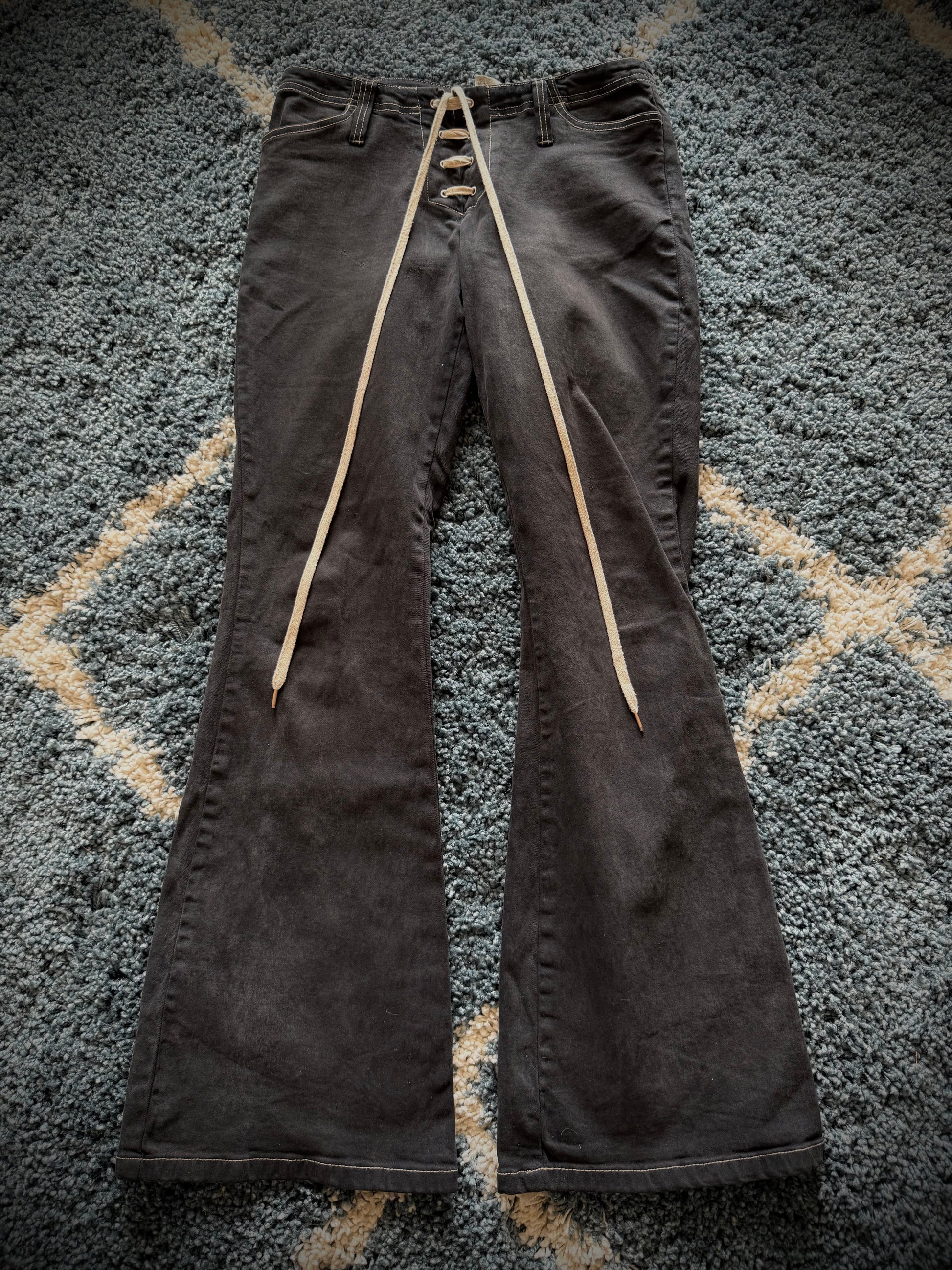 KIE Laced up leather pockets flared jeans