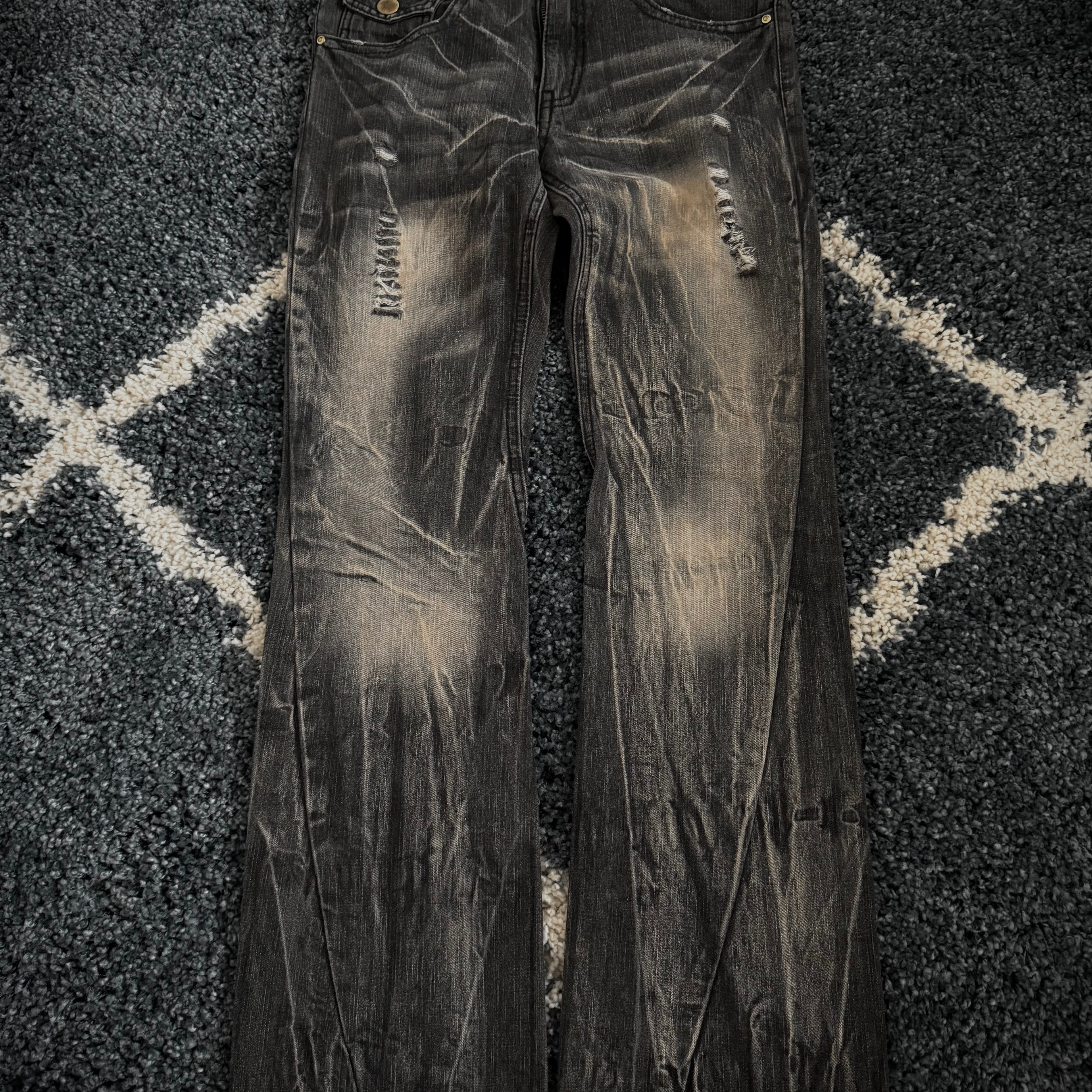 Black Baccara distressed flared denim