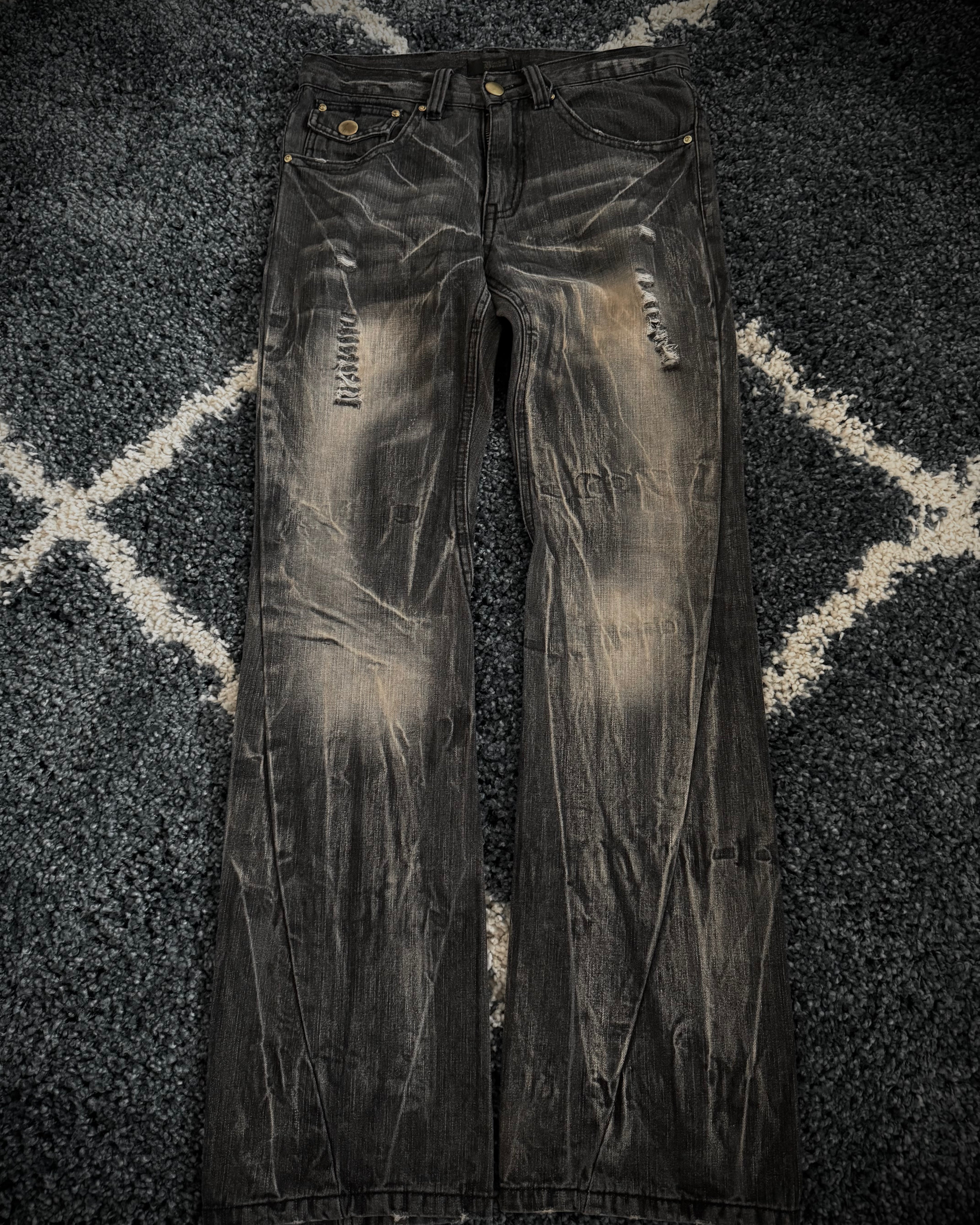Black Baccara distressed flared denim