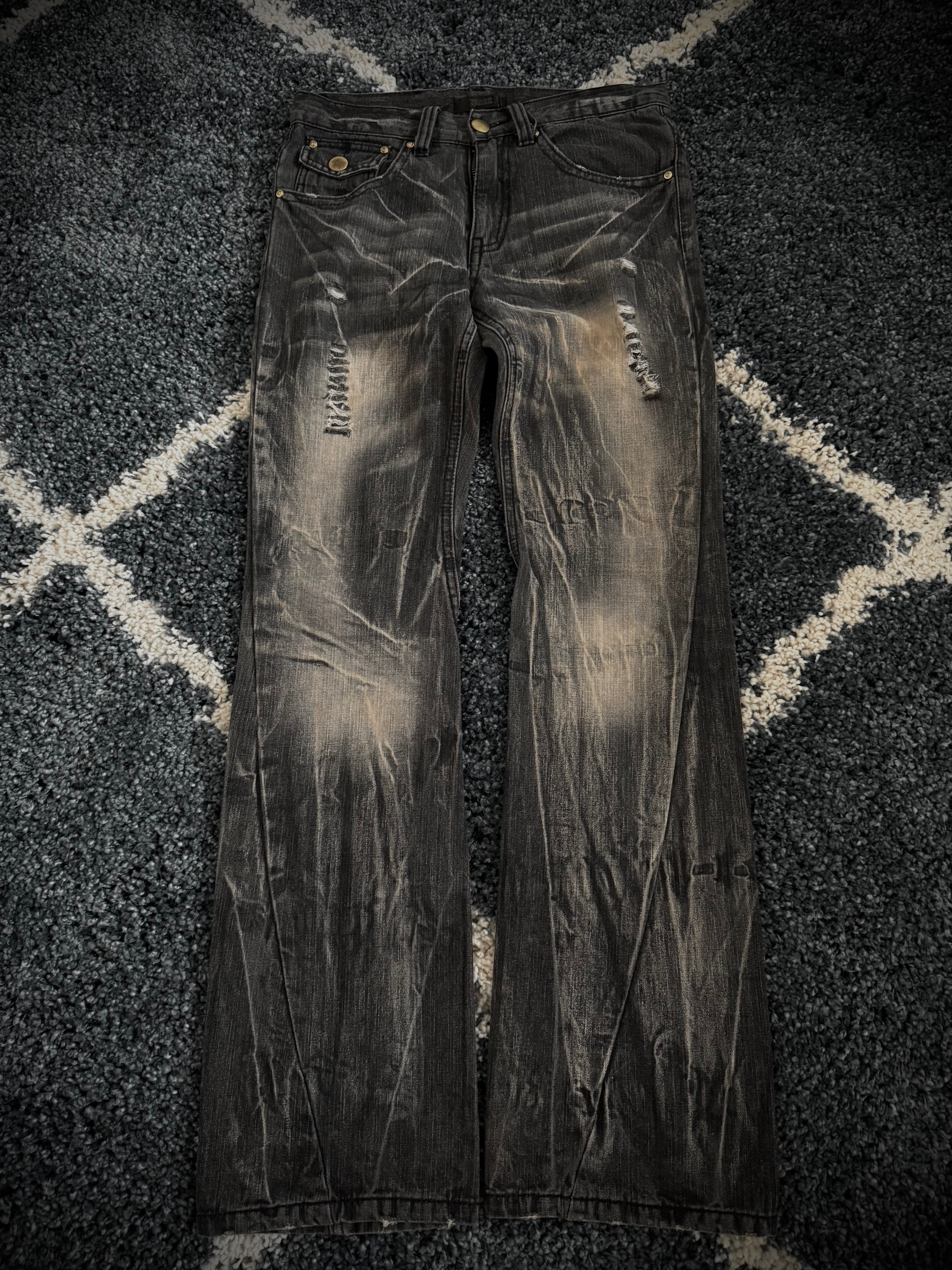 Black Baccara distressed flared denim
