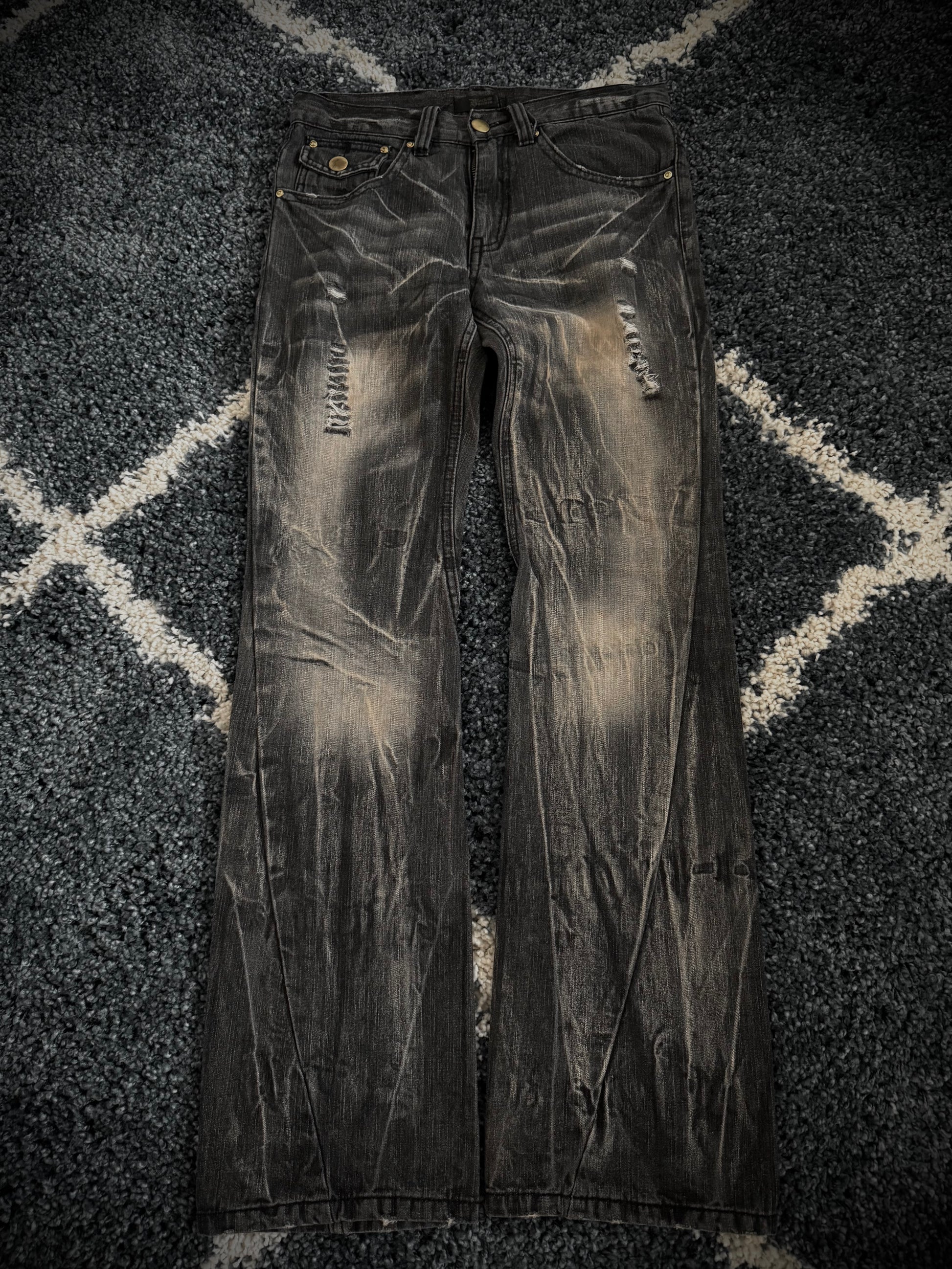 Black Baccara distressed flared denim