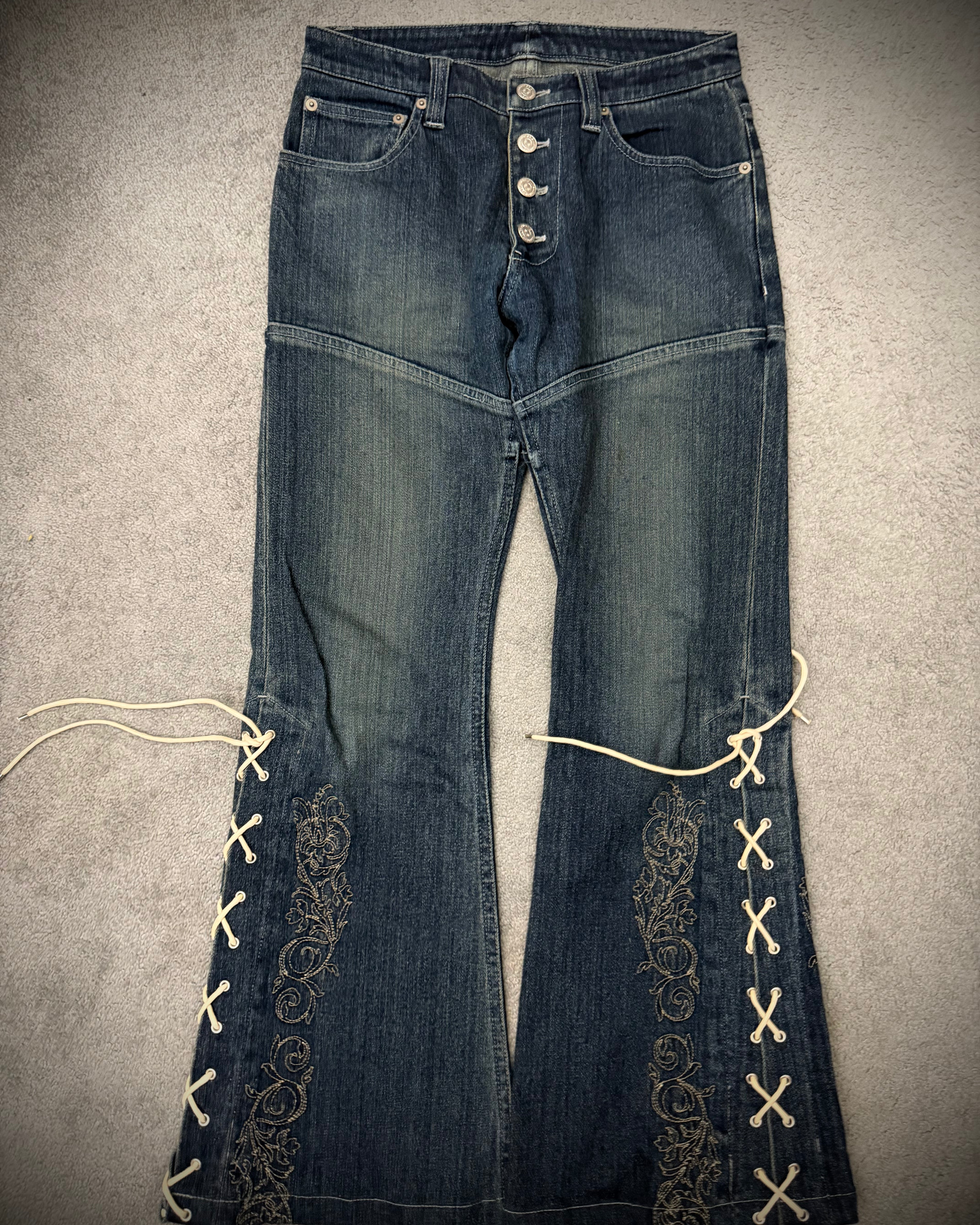 Tornado Mart Laced Up Tribal Flared Denim Pants