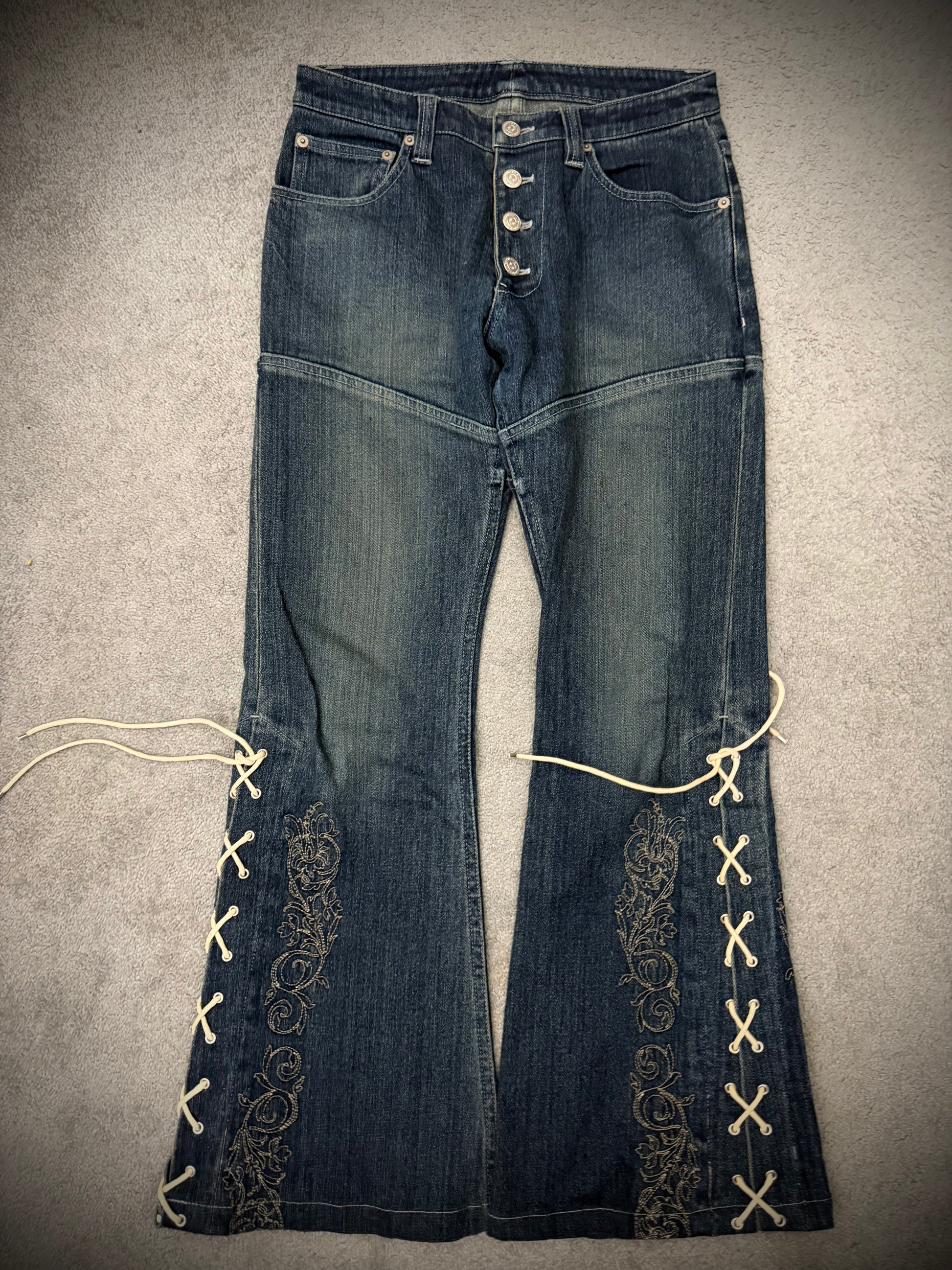 Tornado Mart Laced Up Tribal Flared Denim Pants