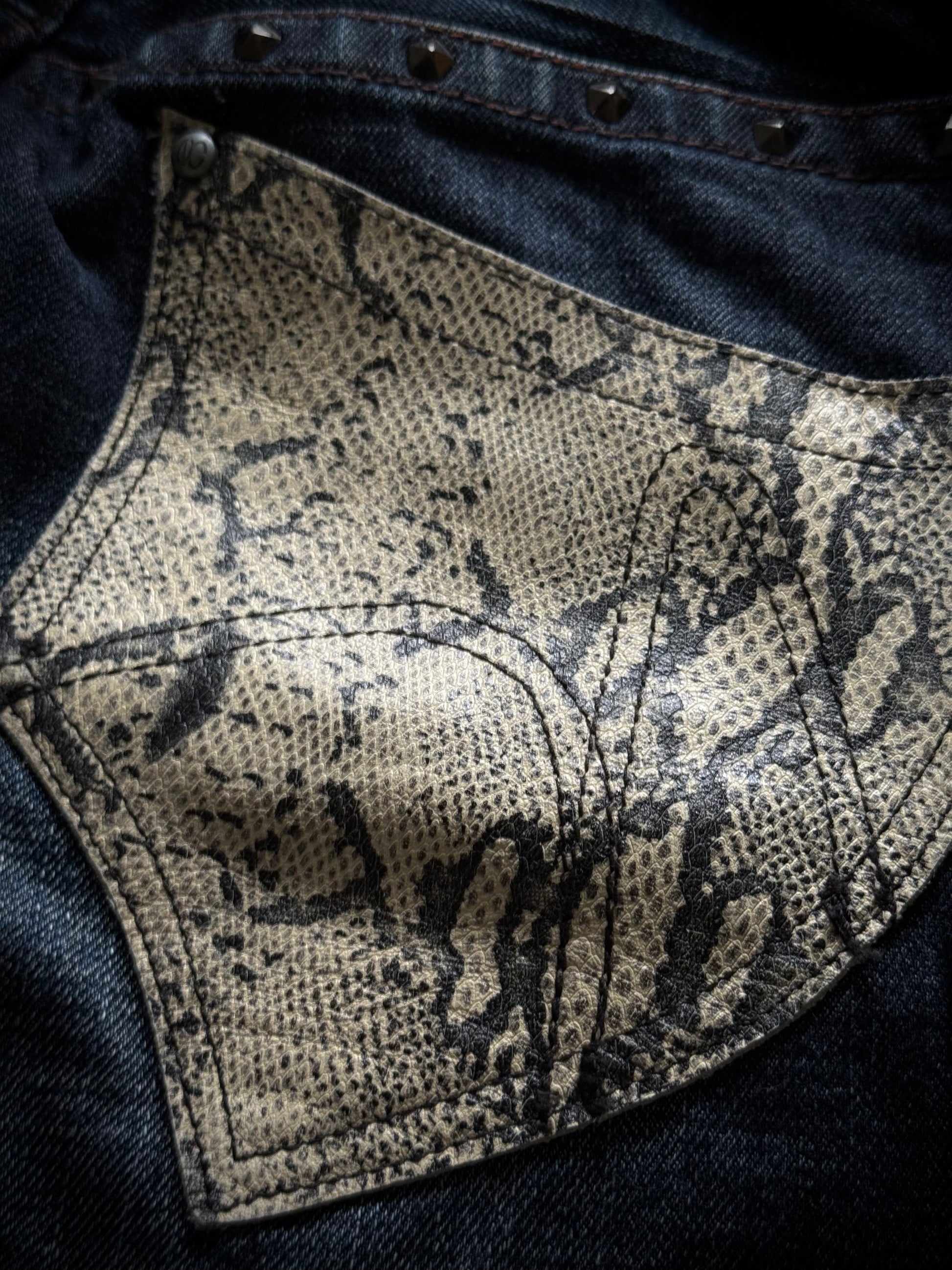 Nicole Club studded Snakeskin flared jeans