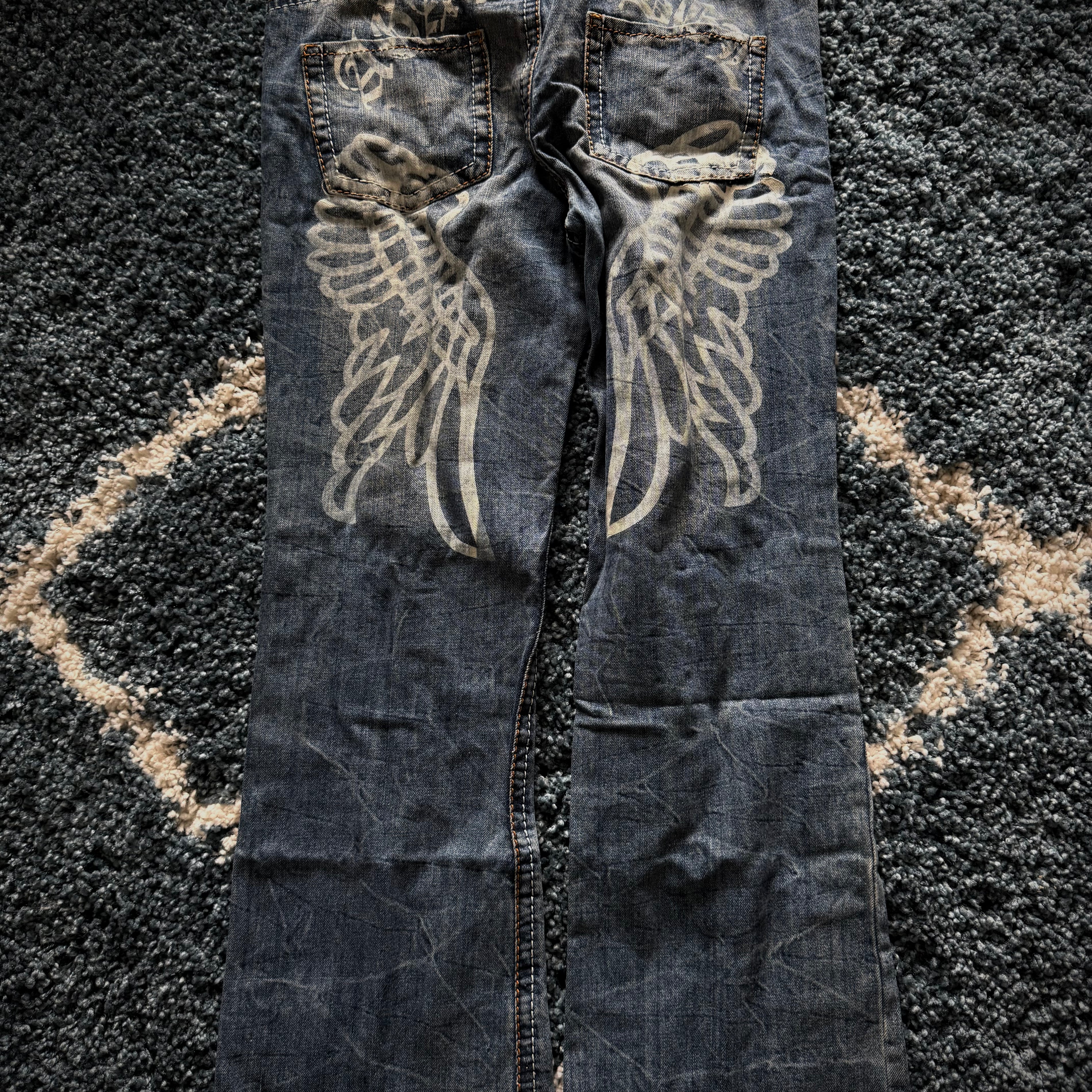 Agathe Wing Distressed honeycomb flared Pants