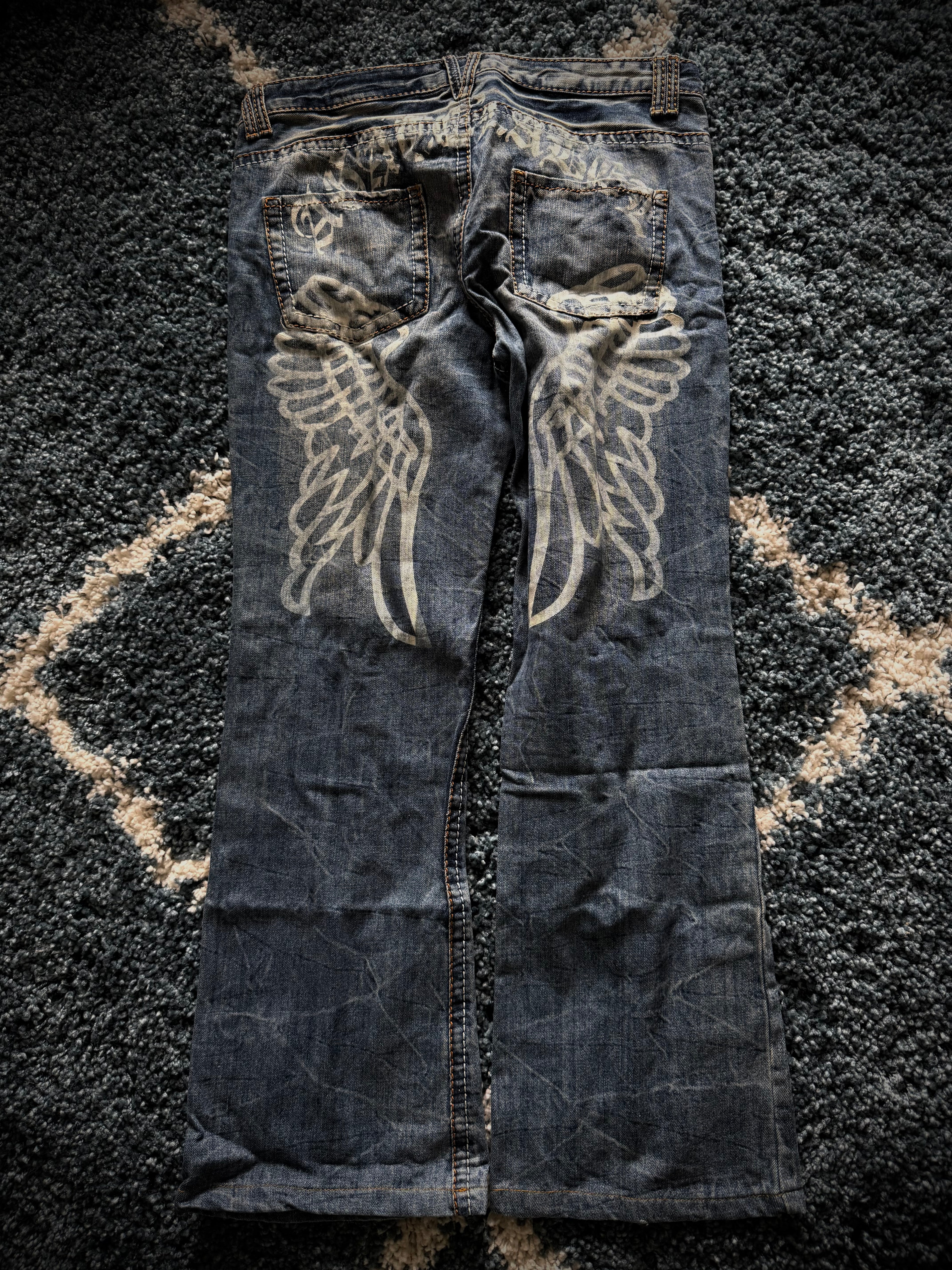 Agathe Wing Distressed honeycomb flared Pants