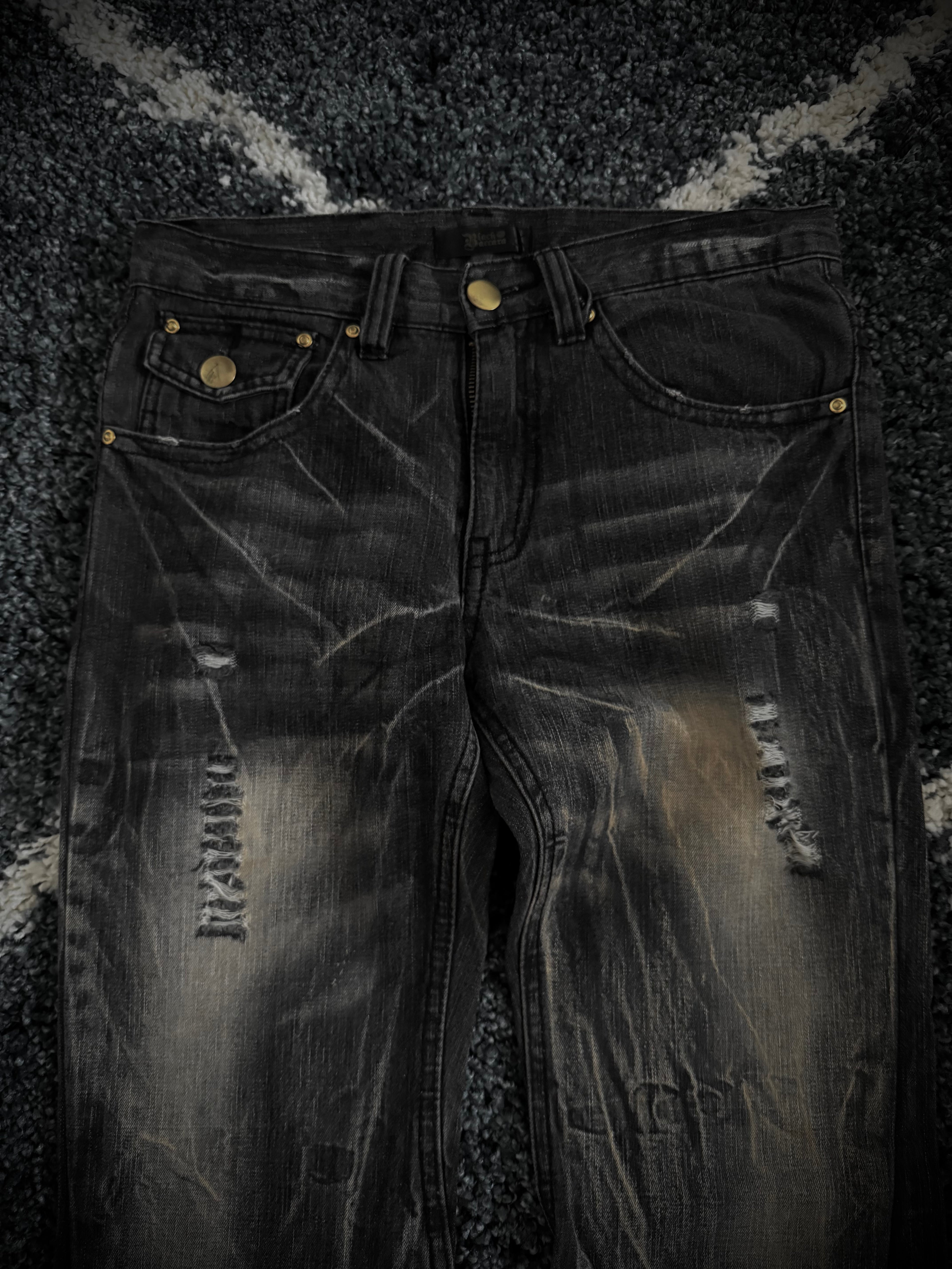 Black Baccara distressed flared denim