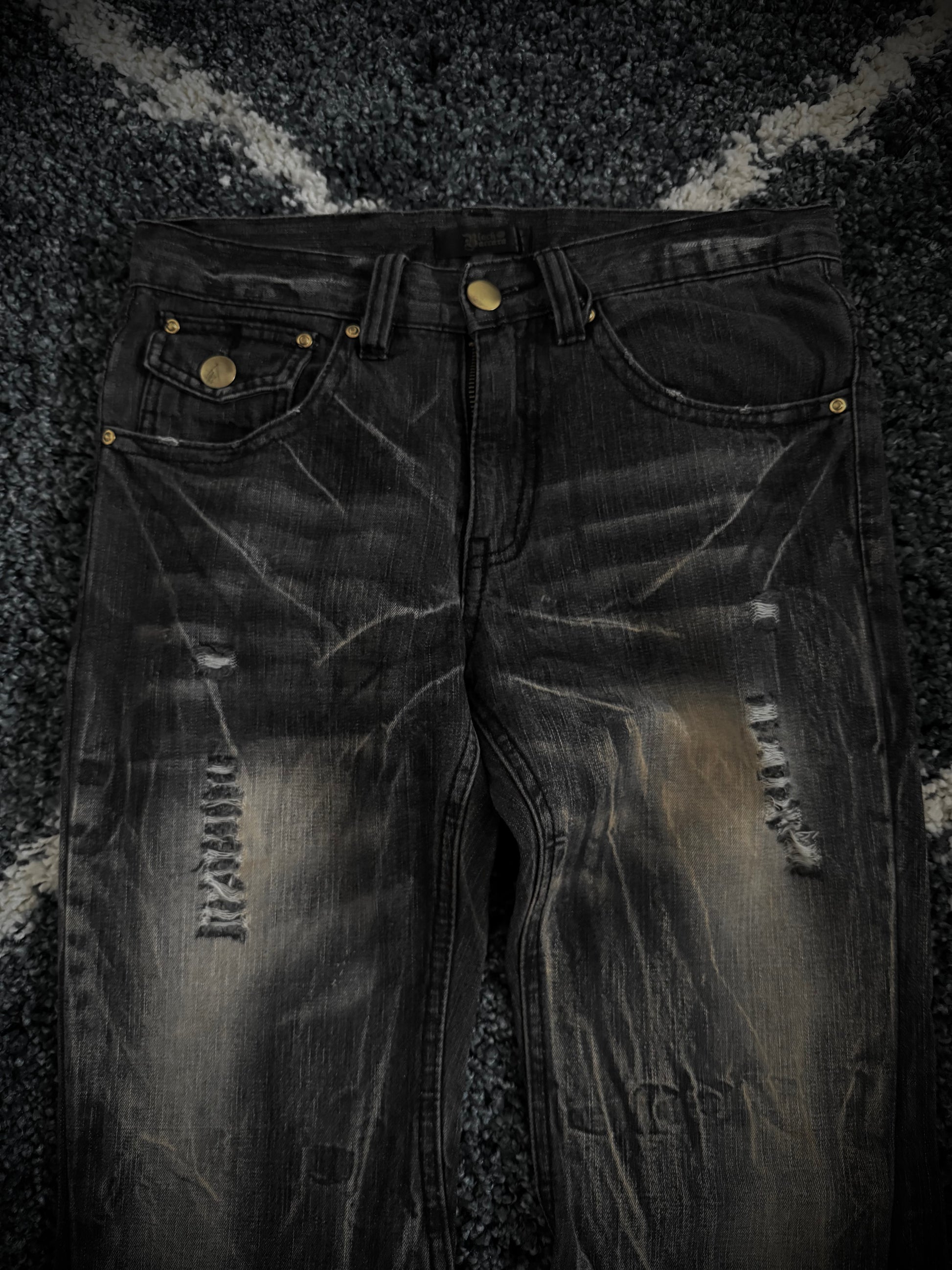 Black Baccara distressed flared denim