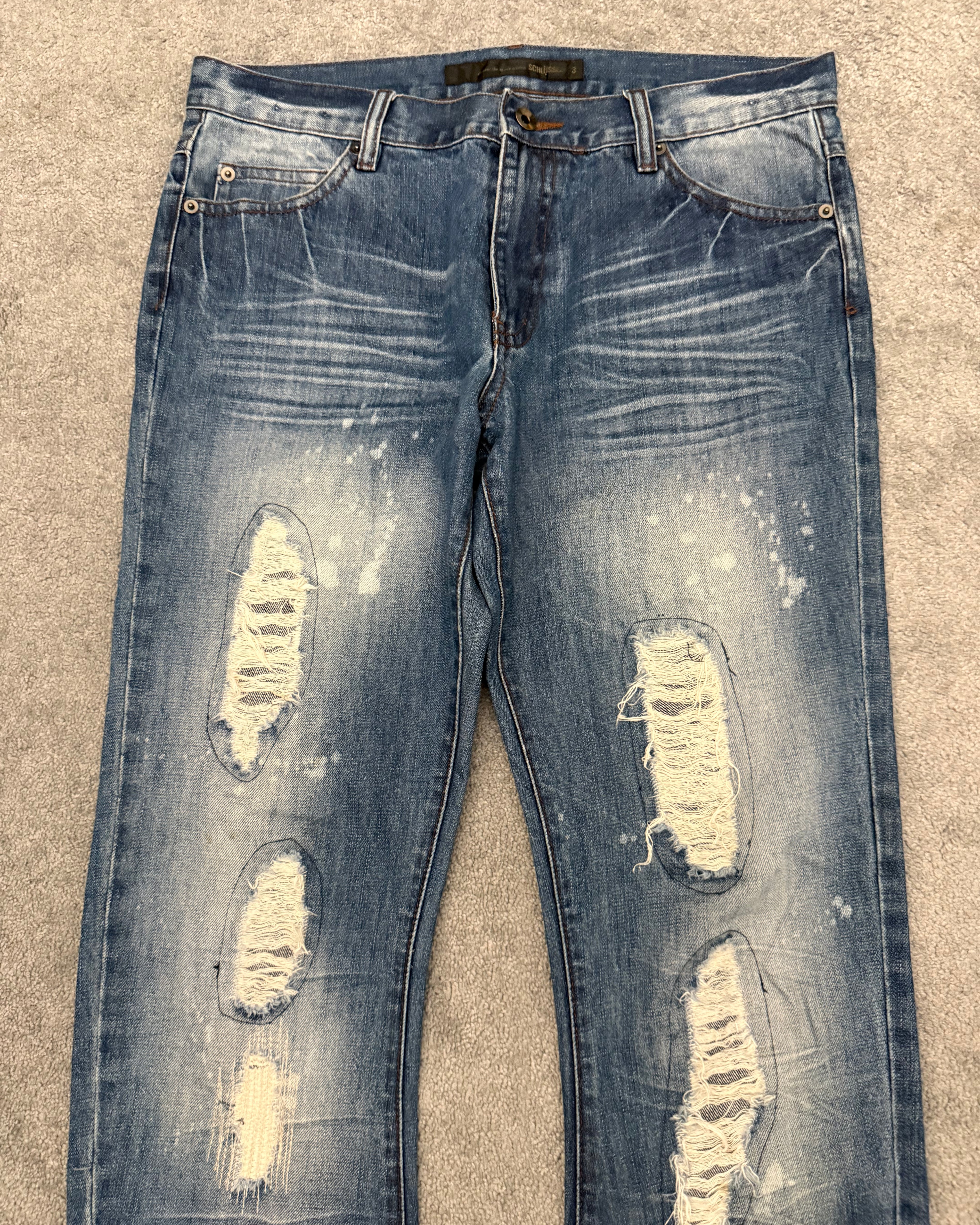 Schlussel distressed banana cut splatterd pants