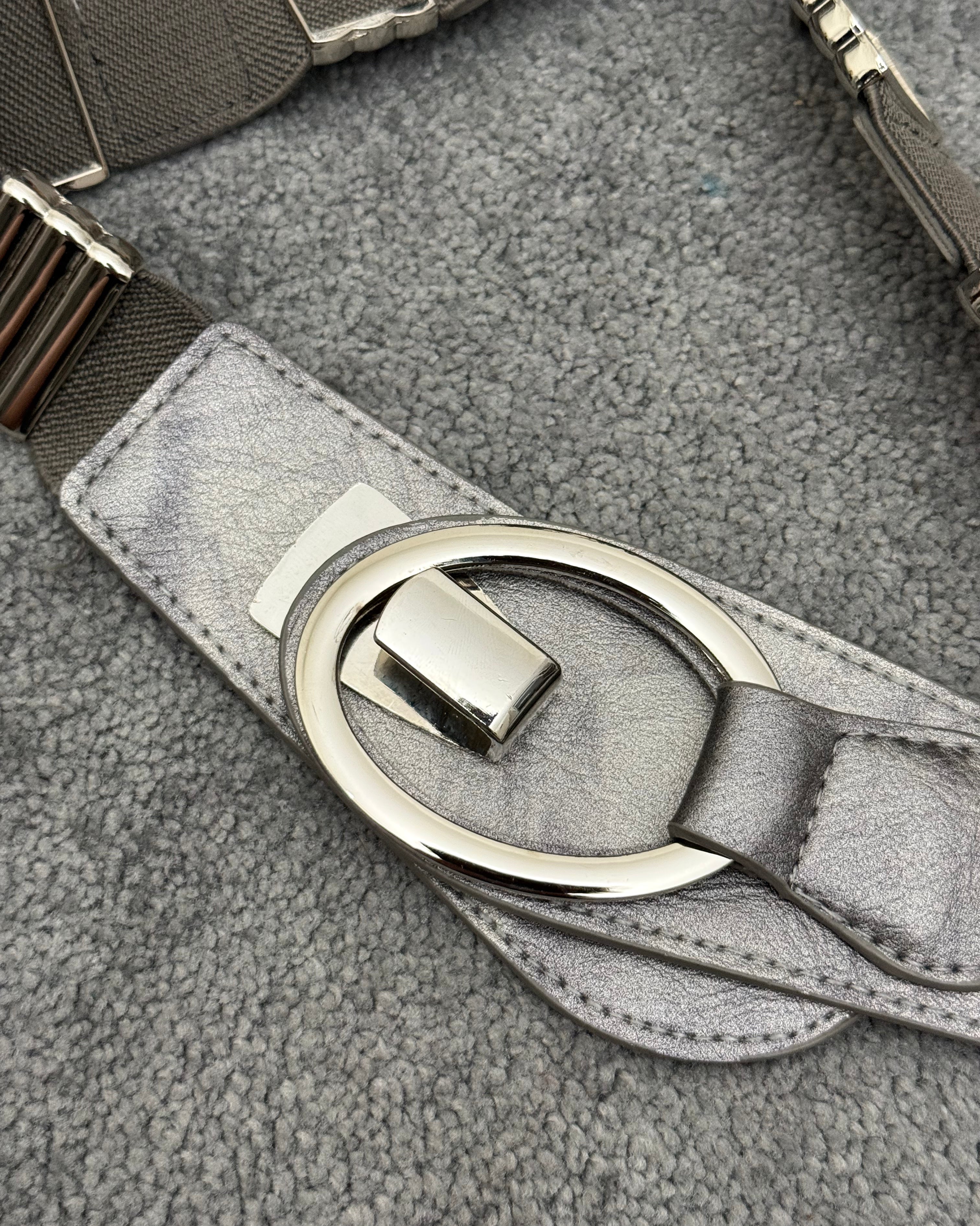 Metallic override belt