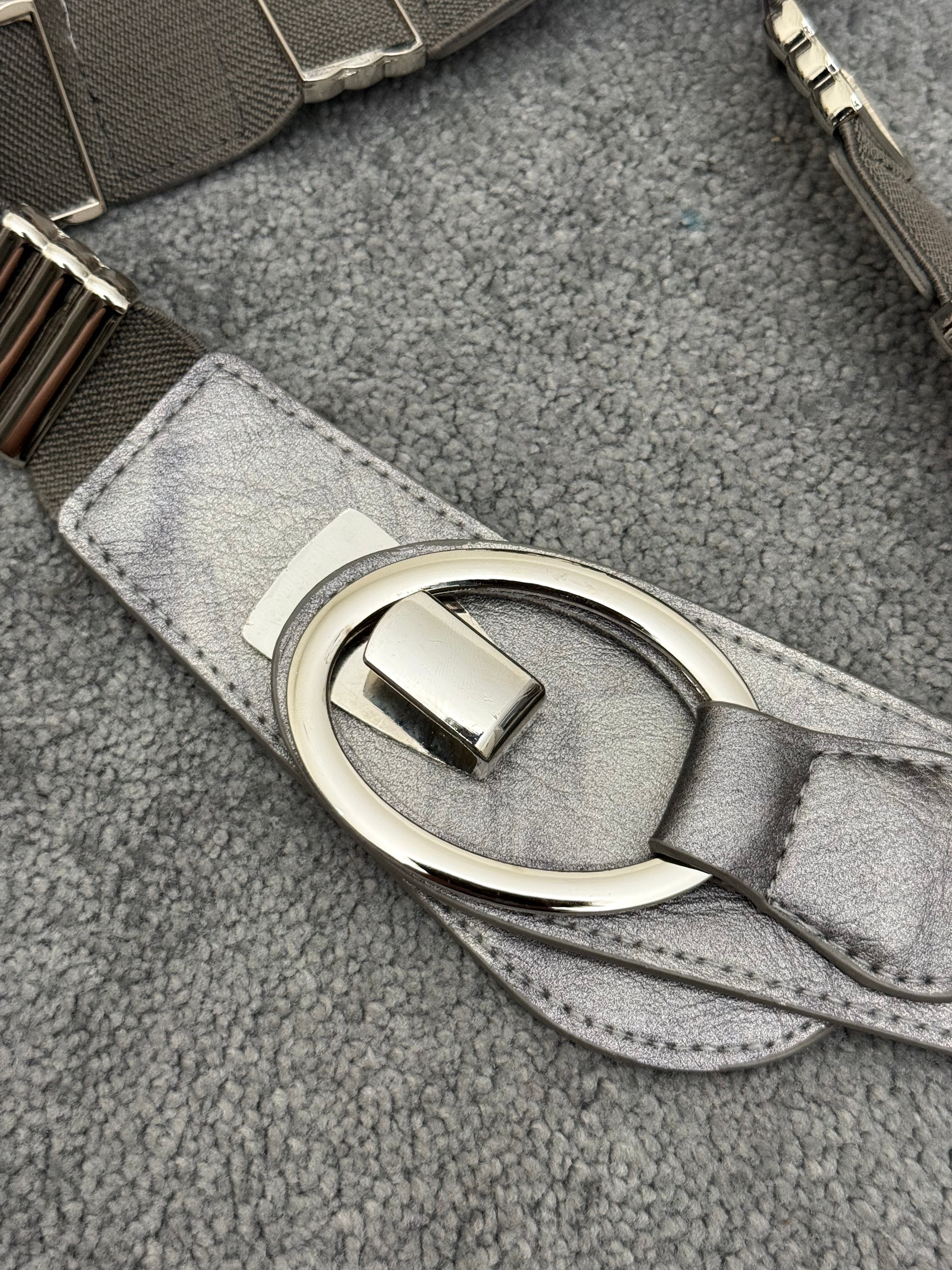 Metallic override belt