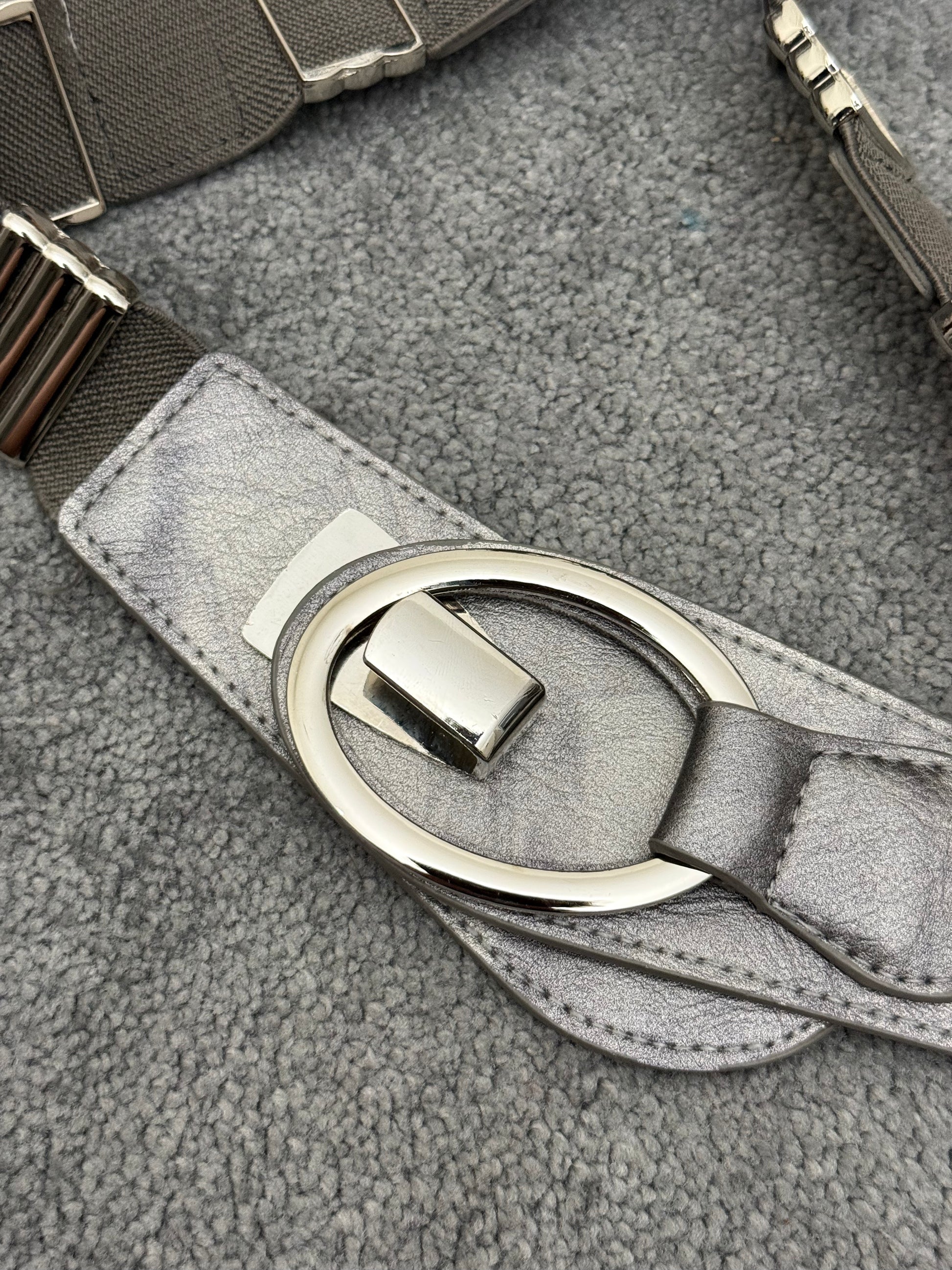Metallic override belt