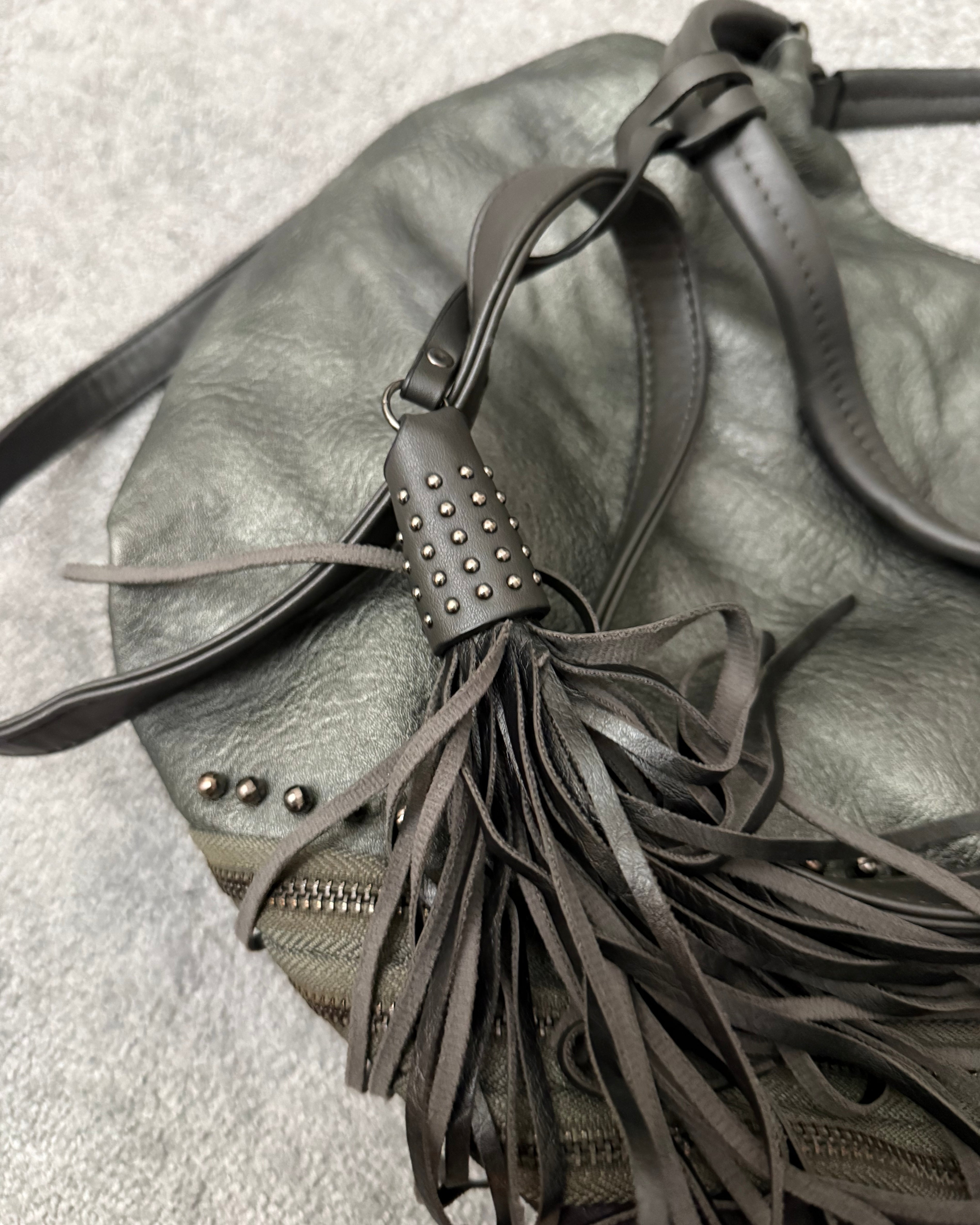MUTANT tripple zipper studded tassels leather bag