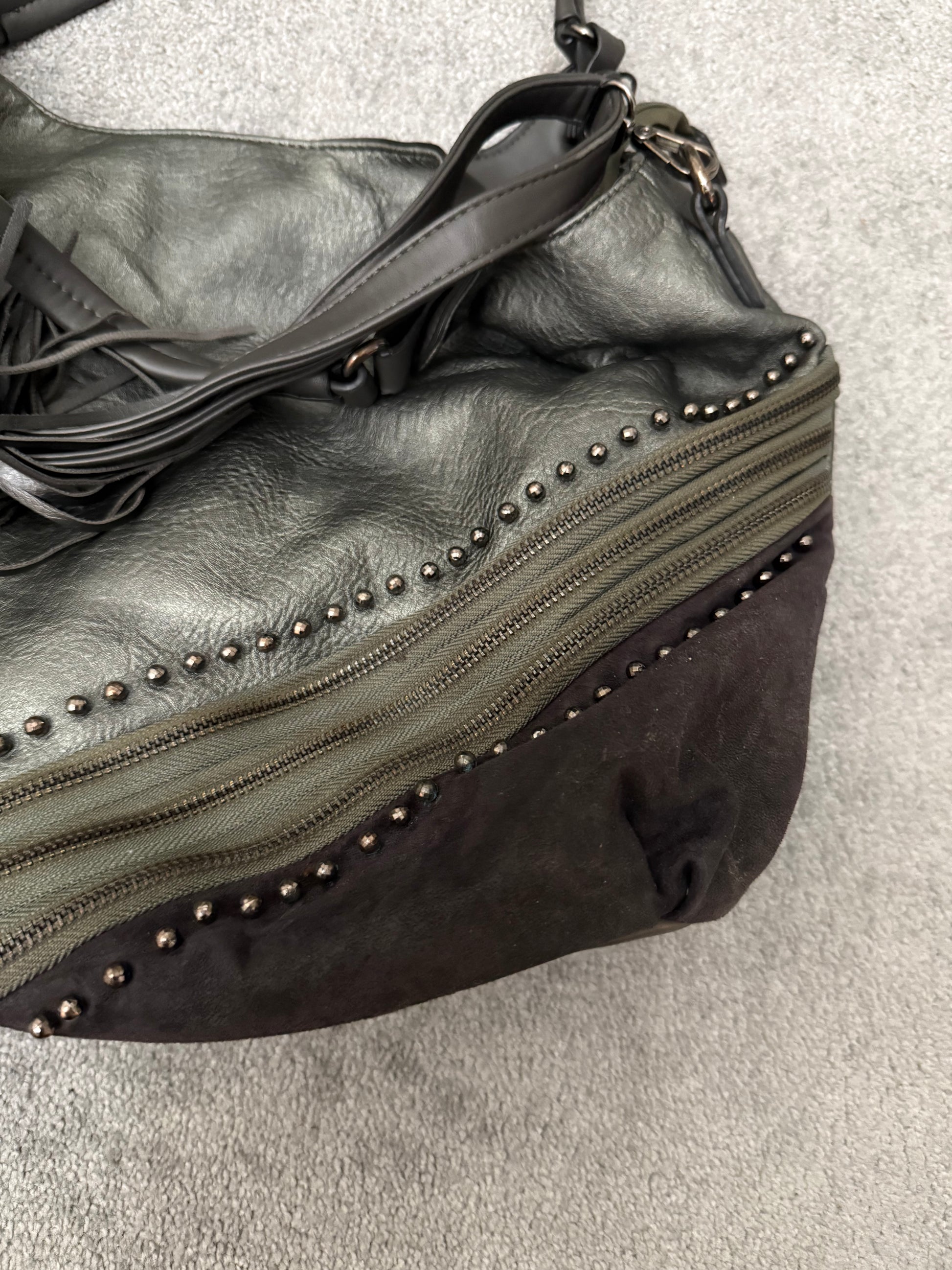 MUTANT tripple zipper studded tassels leather bag