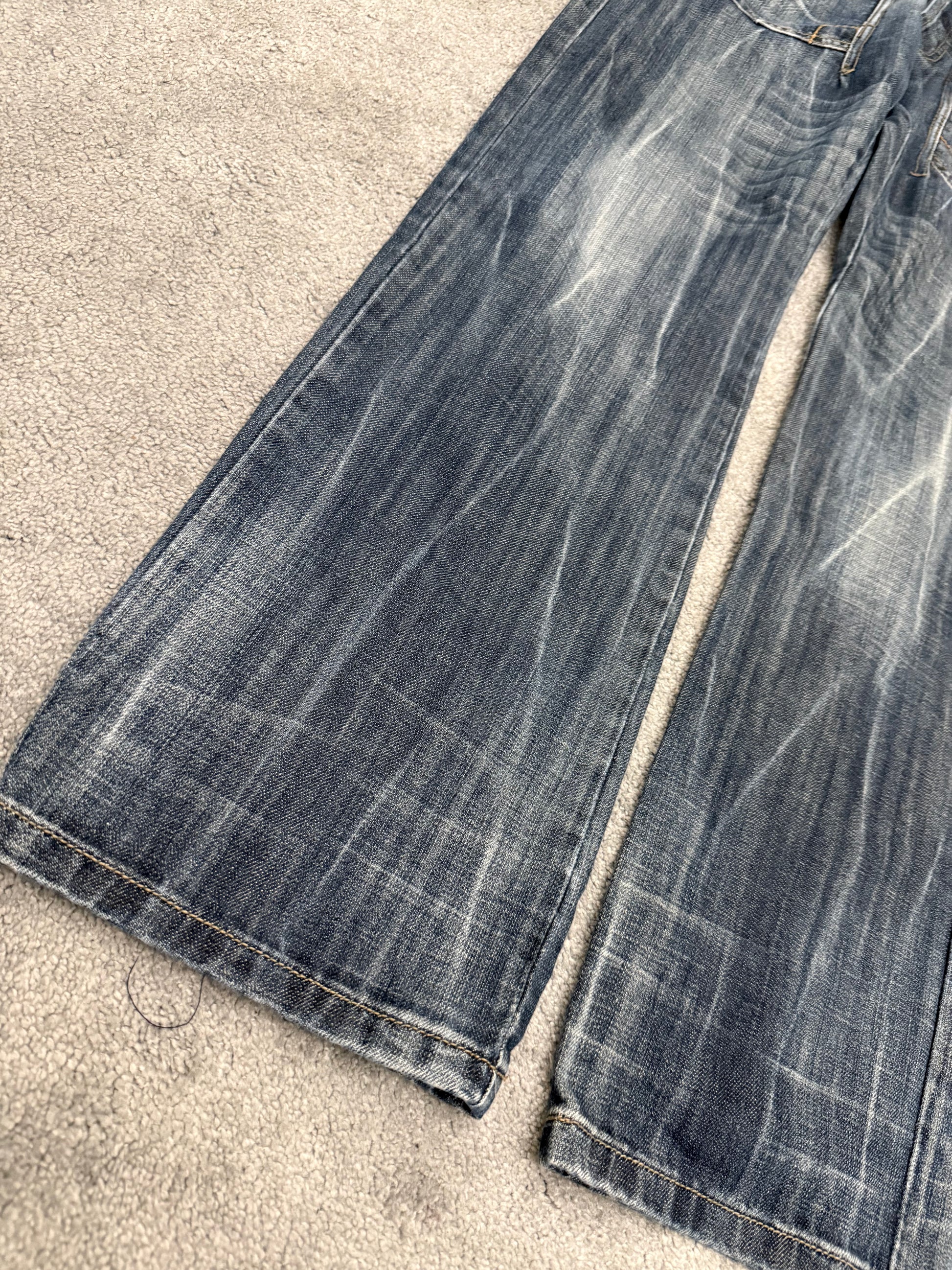 Kenzaro sword pockets Clawmark flared denim