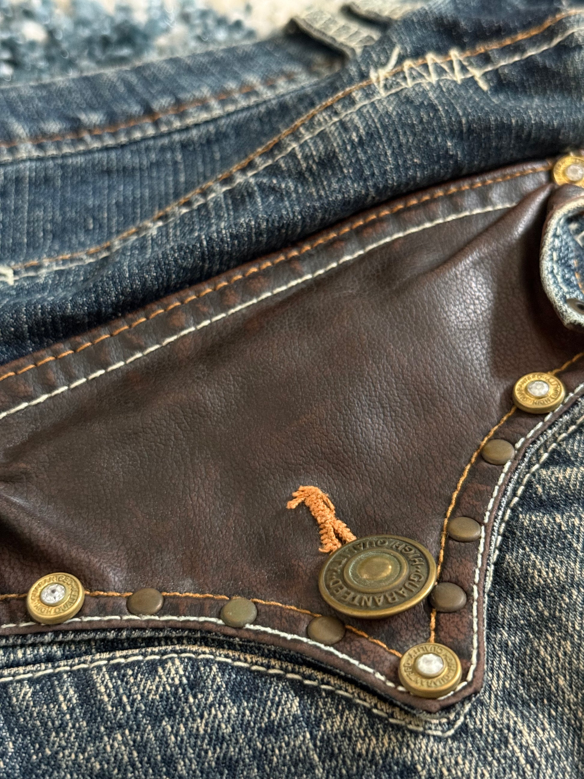 Indecent phantom leather details flared denim