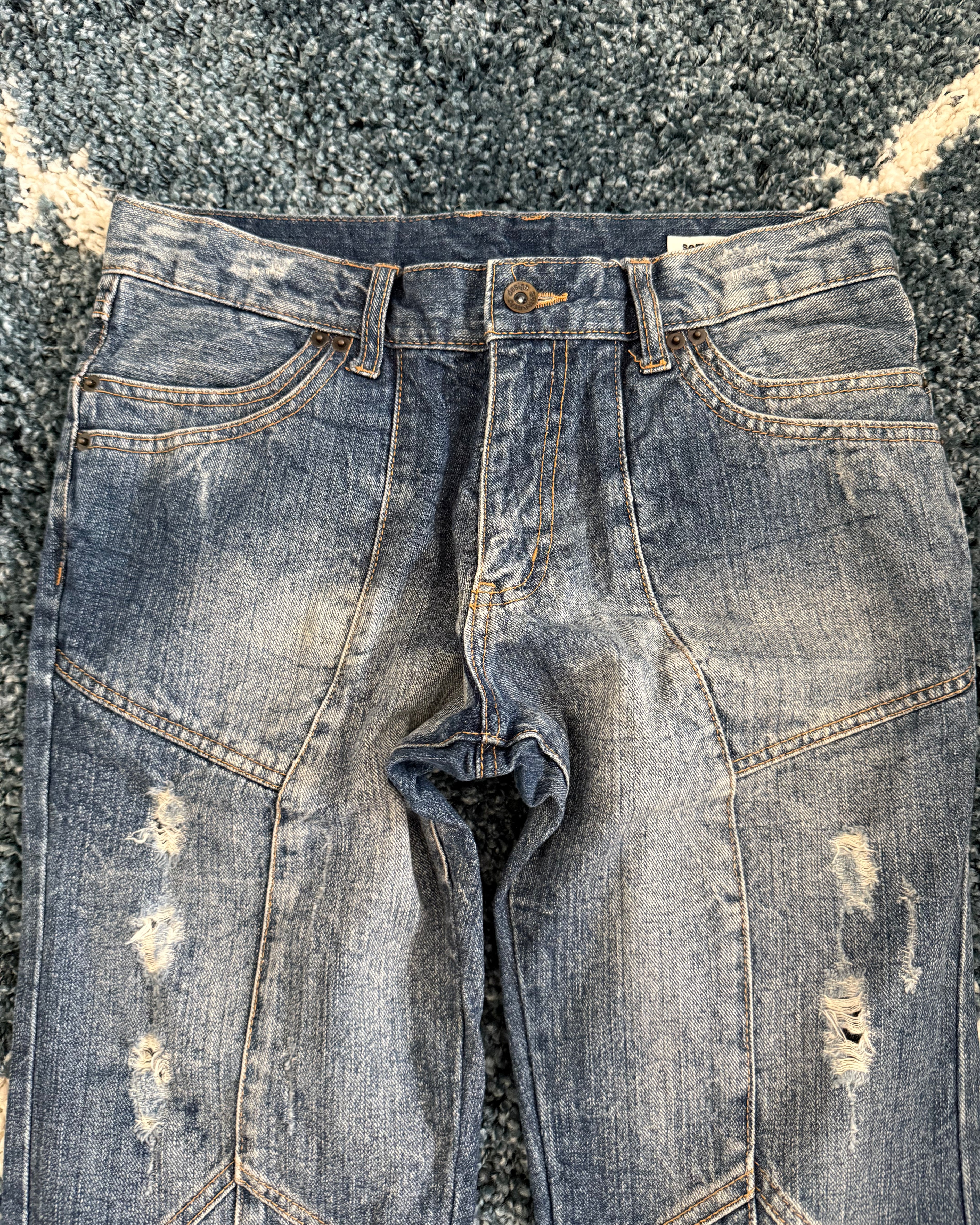 Semantic Design Spiral flared denim