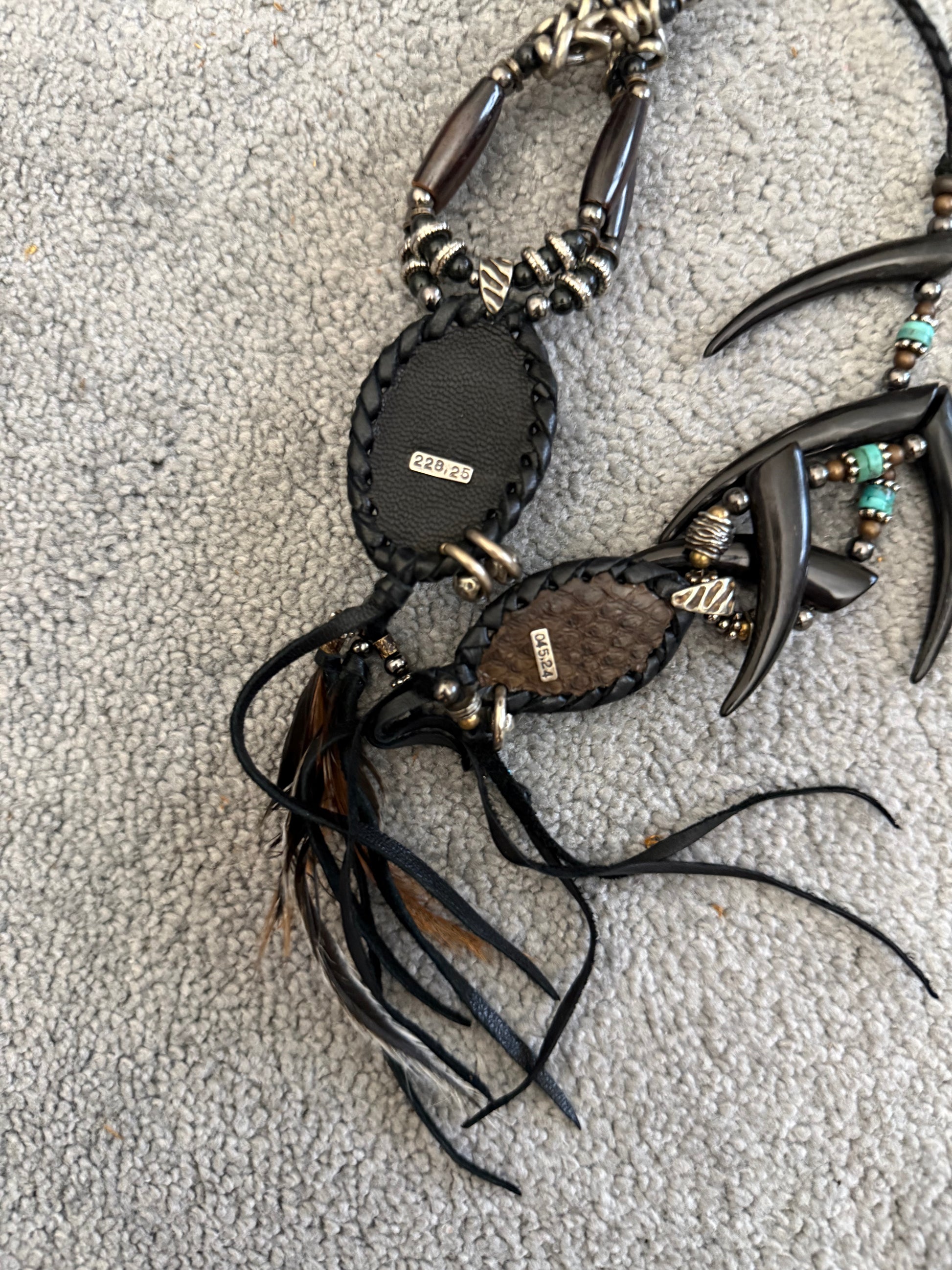 14th Addiction 1/1 Hyperclaw feather necklace