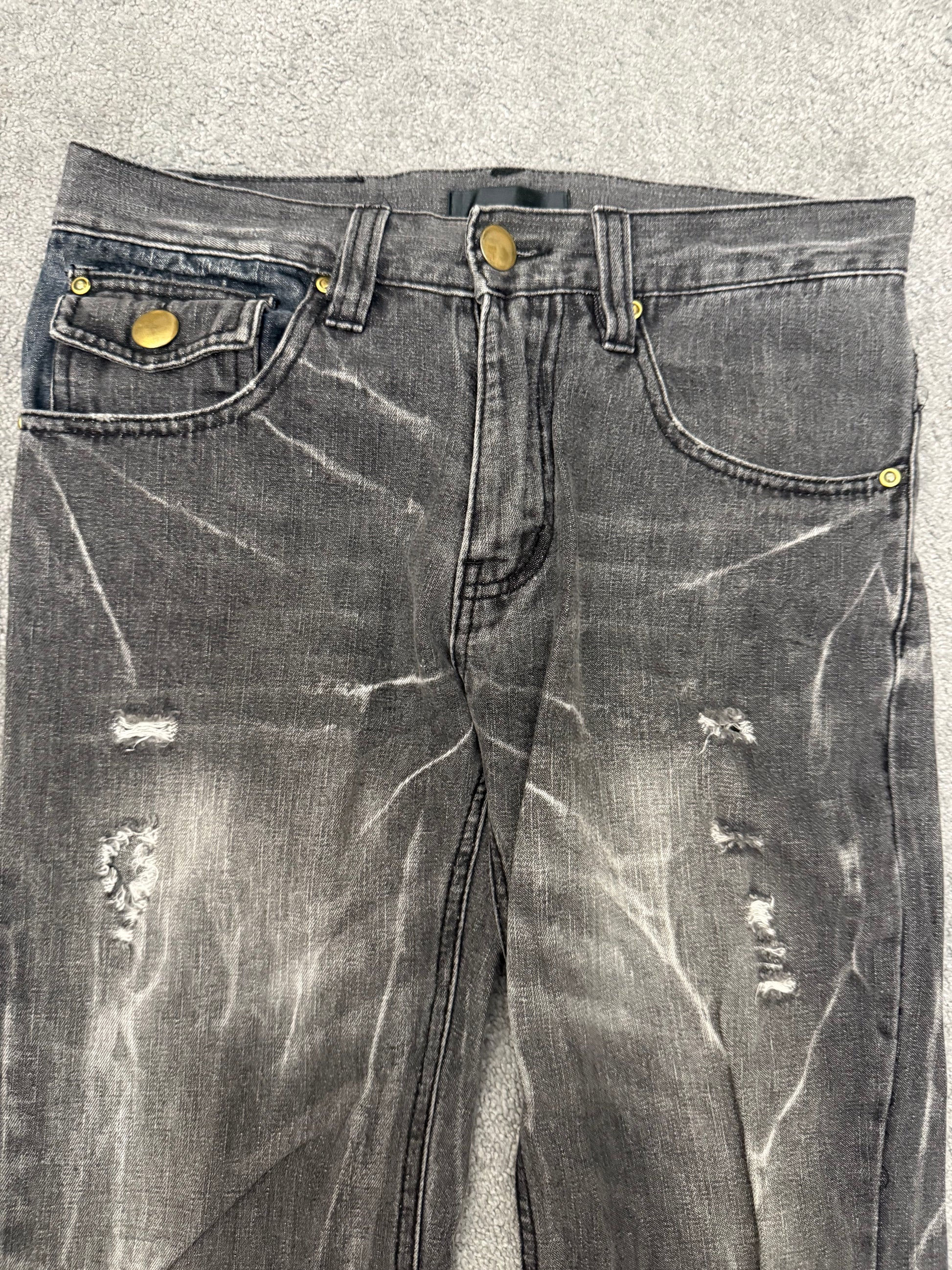 Black Baccara Distressed spiral flared Pants