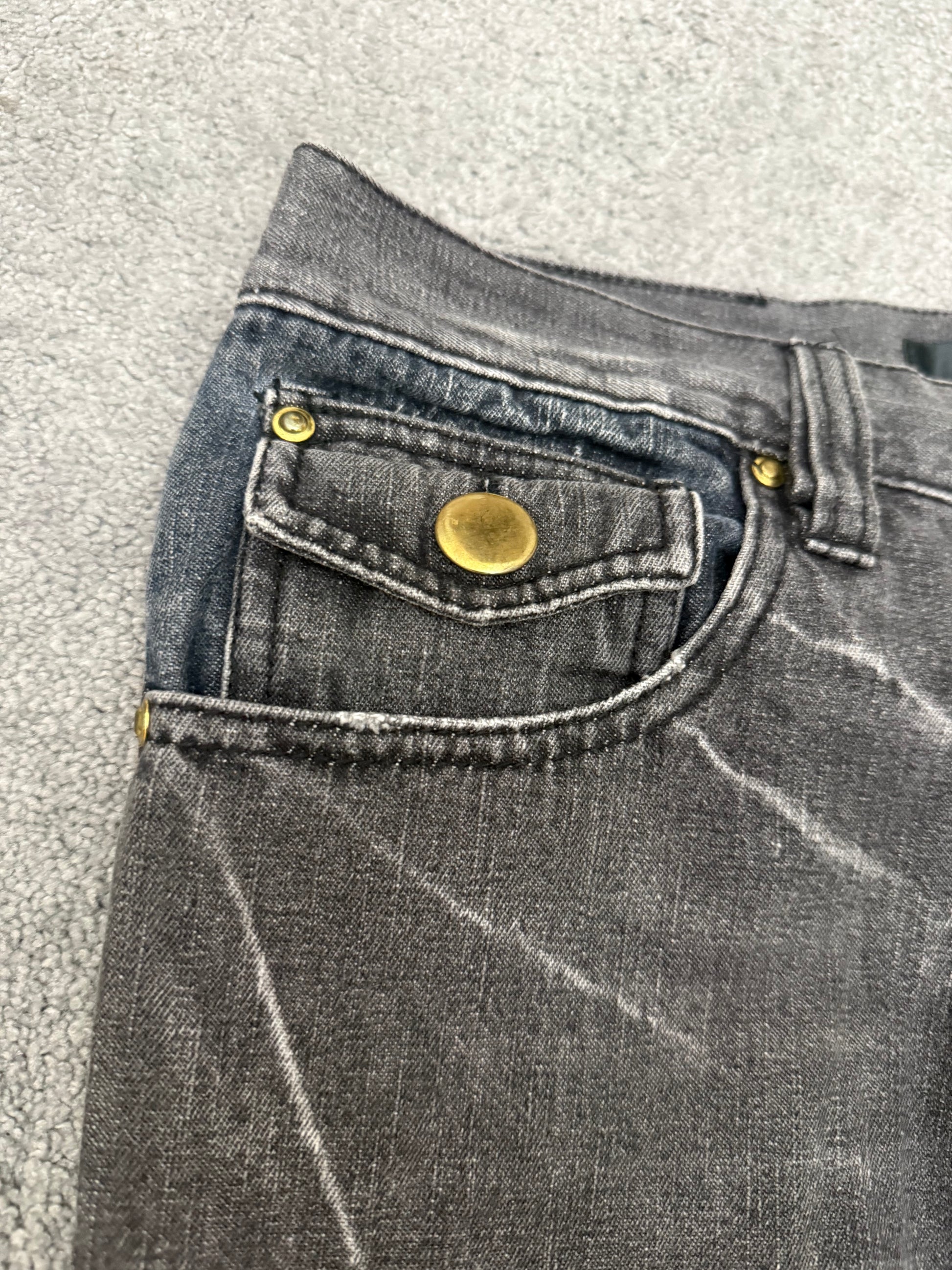 Black Baccara Distressed spiral flared Pants