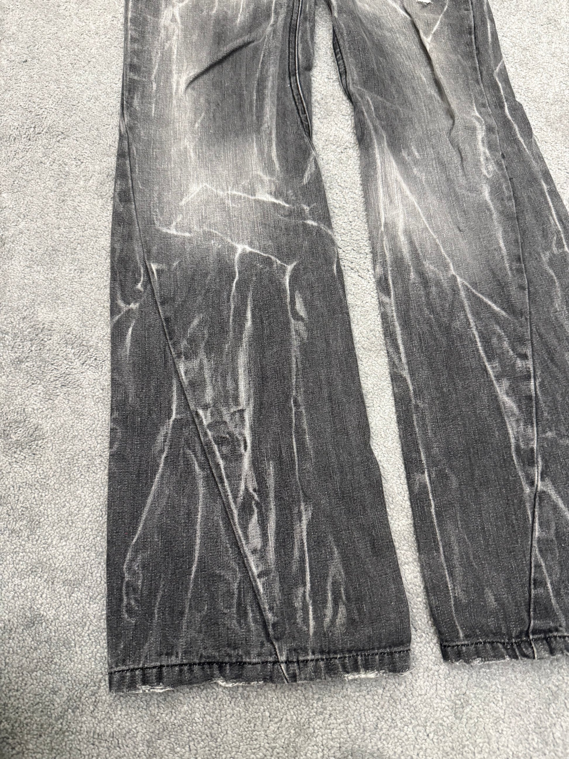 Black Baccara Distressed spiral flared Pants