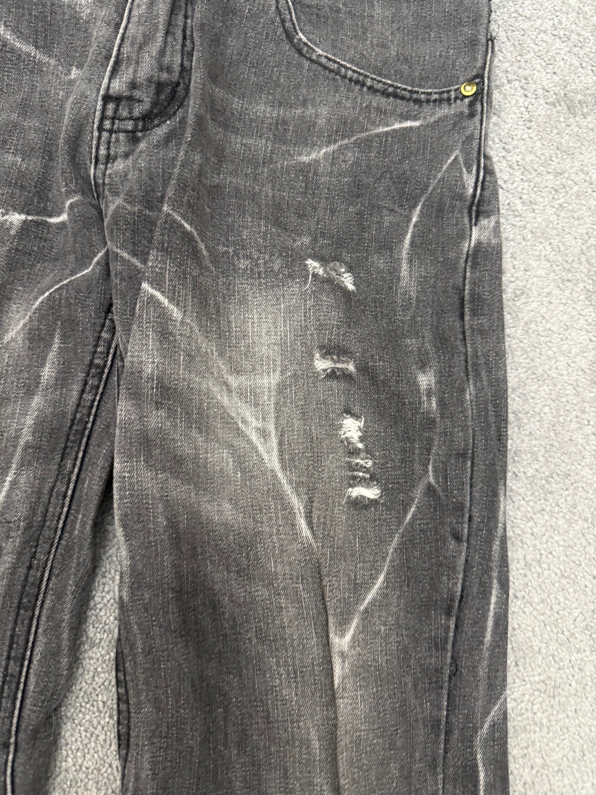 Black Baccara Distressed spiral flared Pants