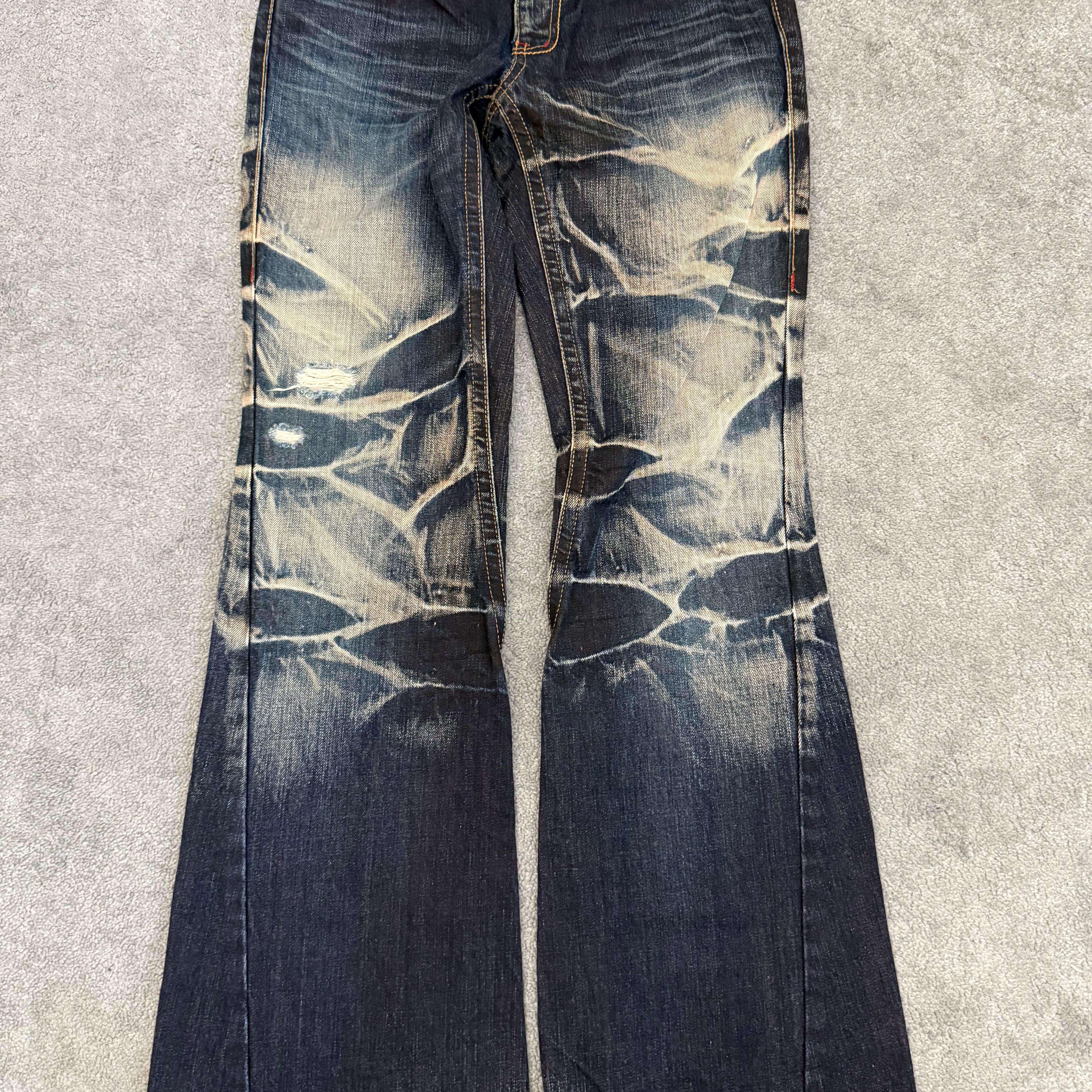 Tornado Mart Ocean Washed Spiral Flared Denim Pants