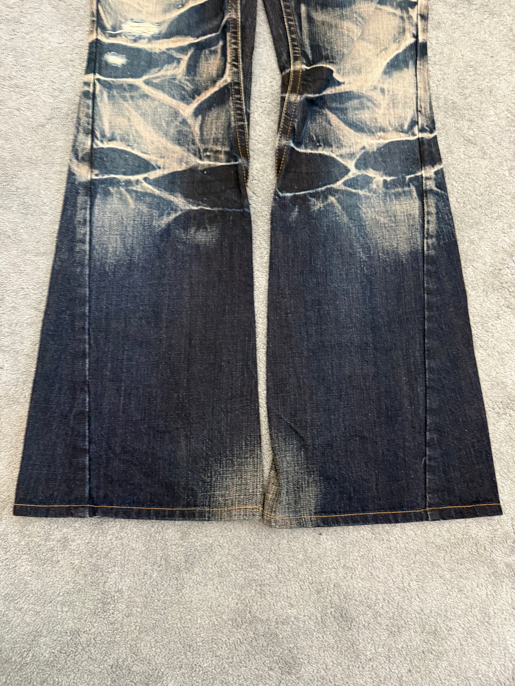 Tornado Mart Ocean Washed Spiral Flared Denim Pants