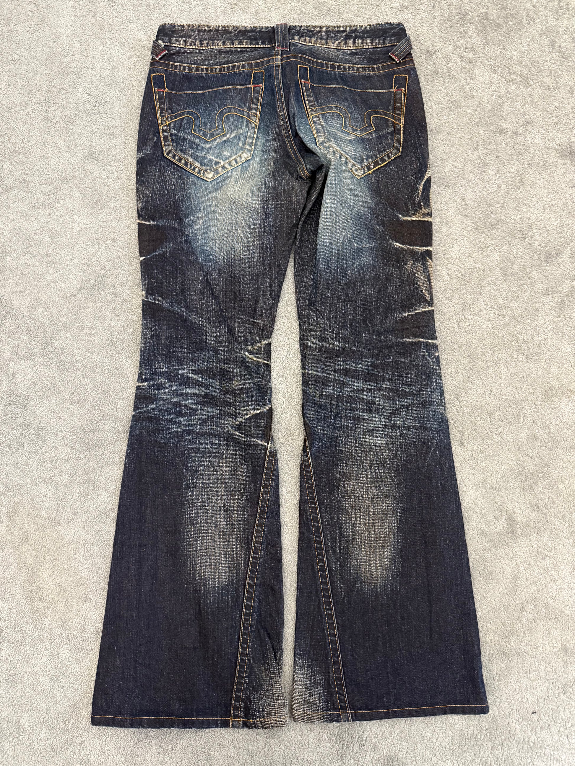 Tornado Mart Ocean Washed Spiral Flared Denim Pants