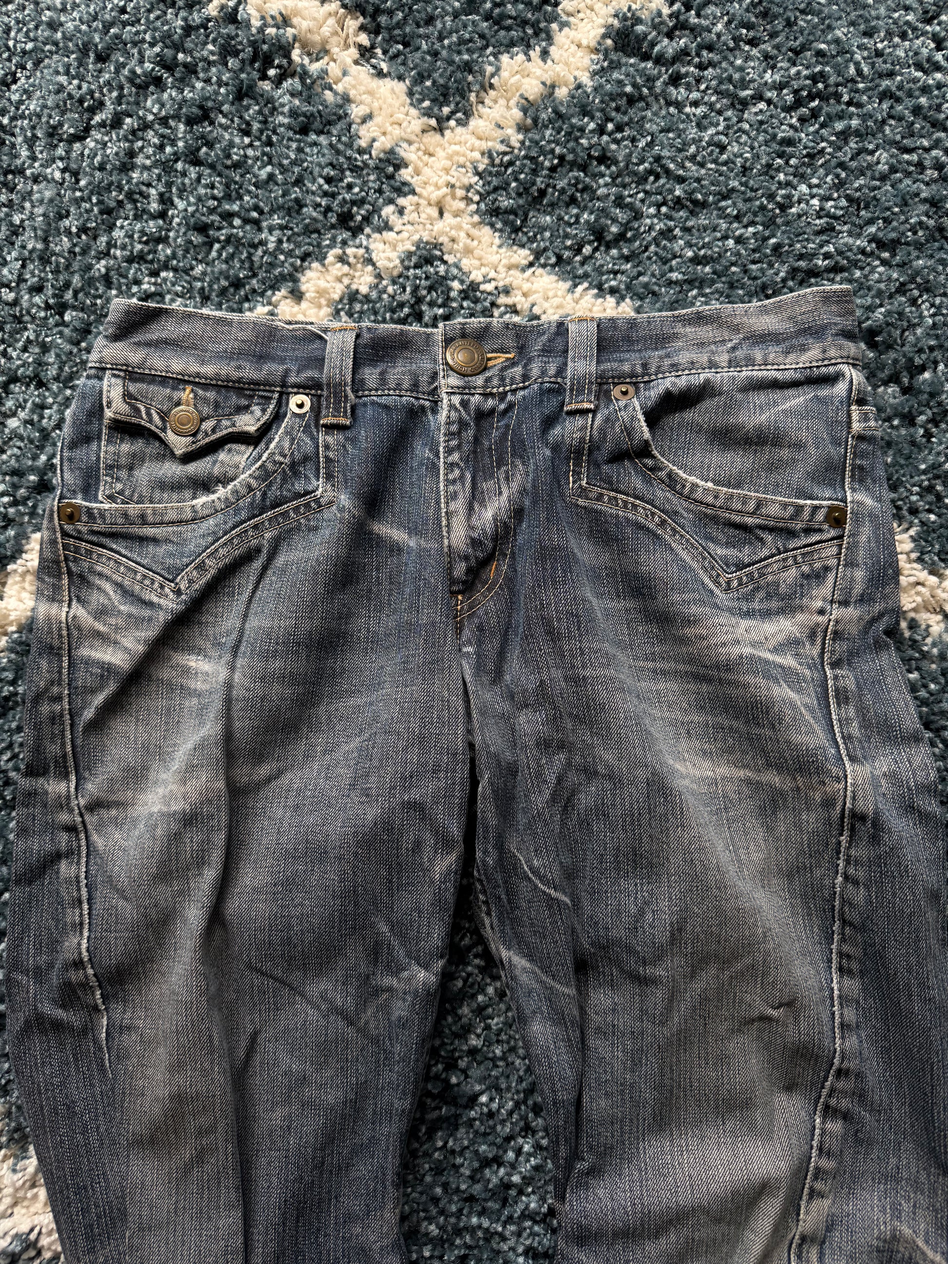 Rattle Trap frozen asymmetrical pocket flared jeans