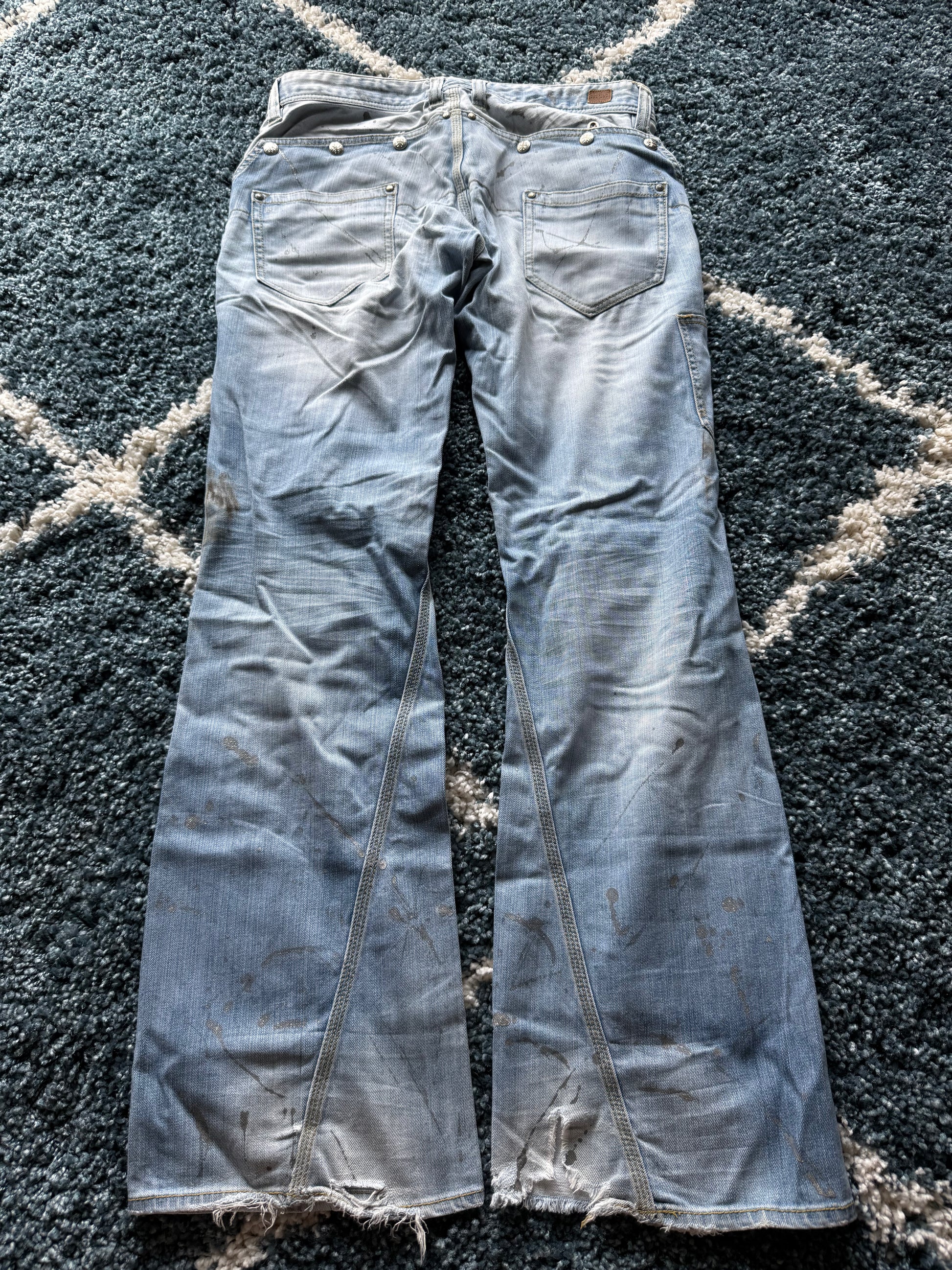Nicole Club hidden pocket splashed spiral flared jeans