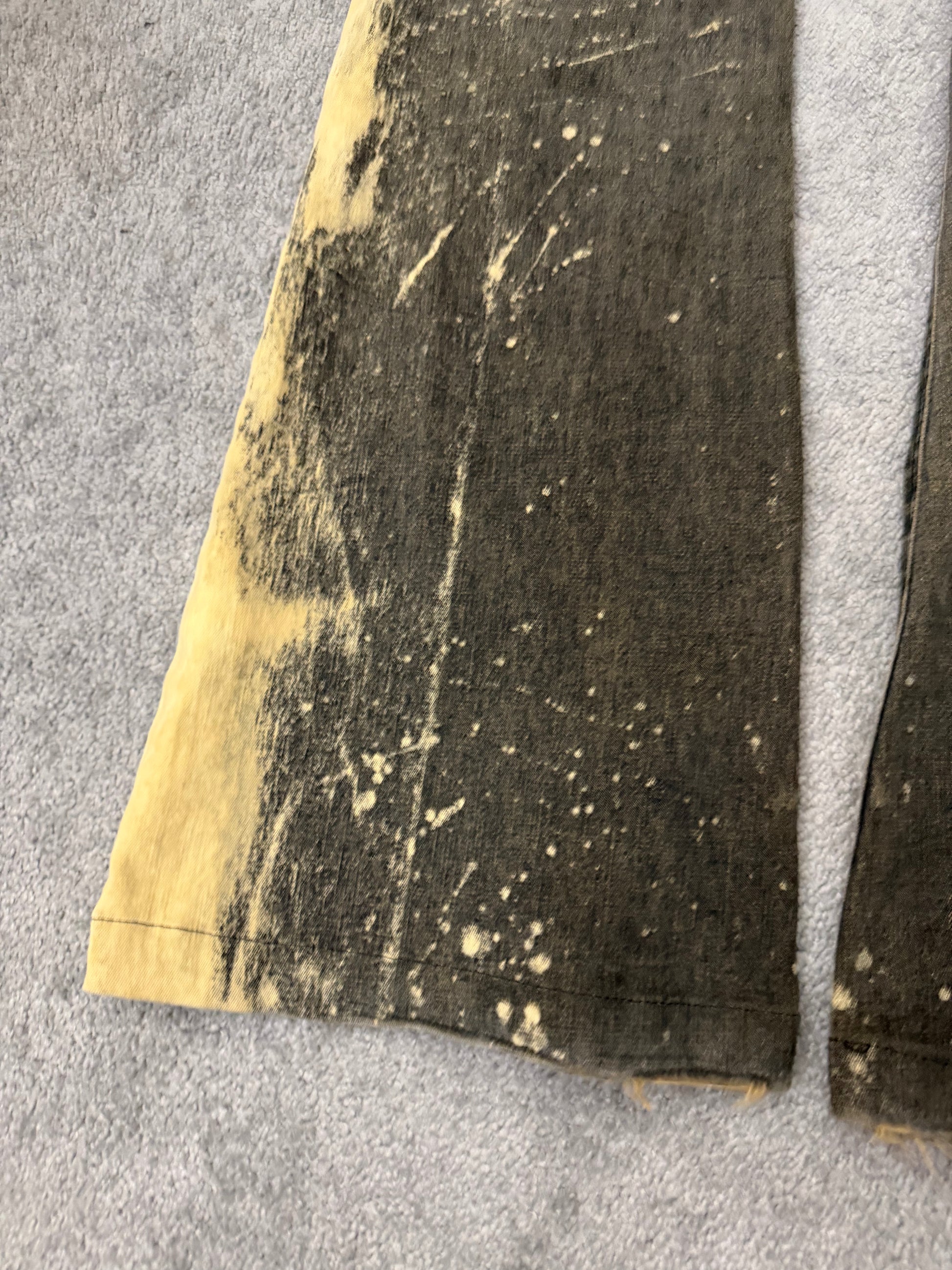 Tornado Mart Smeared Flared Pants