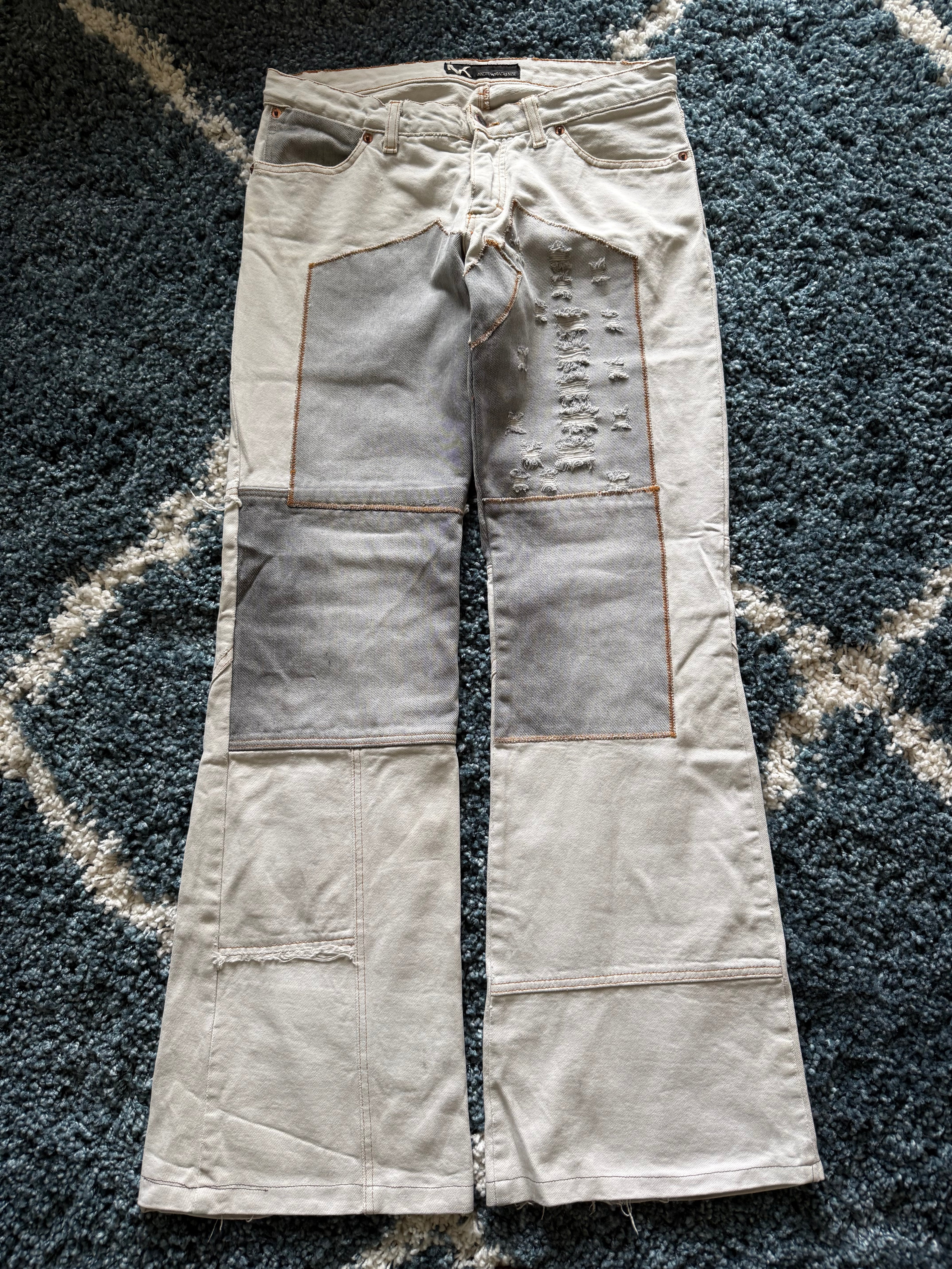 Andrew Mackenzie slashed sword knee blood pocket pants