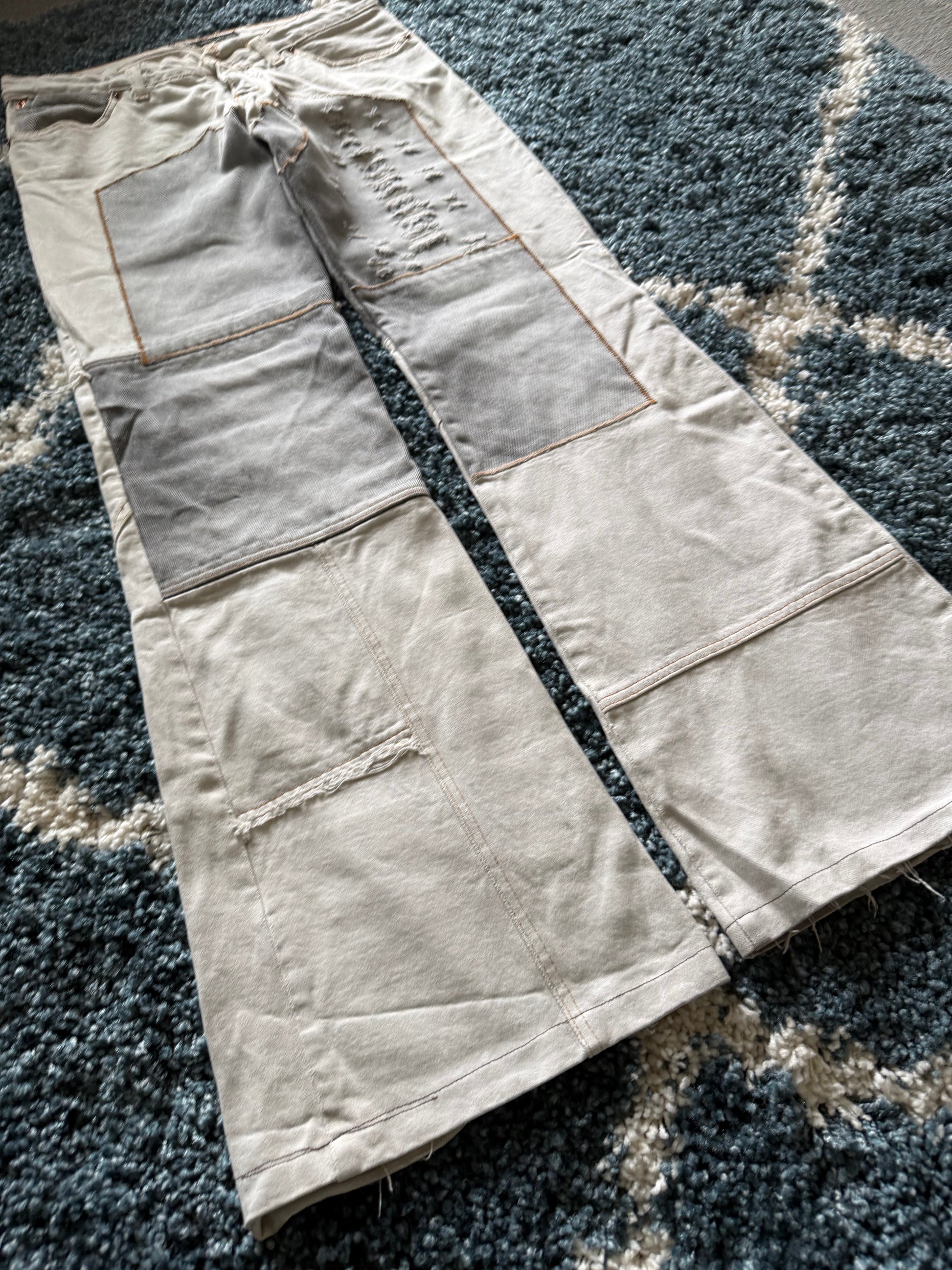 Andrew Mackenzie slashed sword knee blood pocket pants