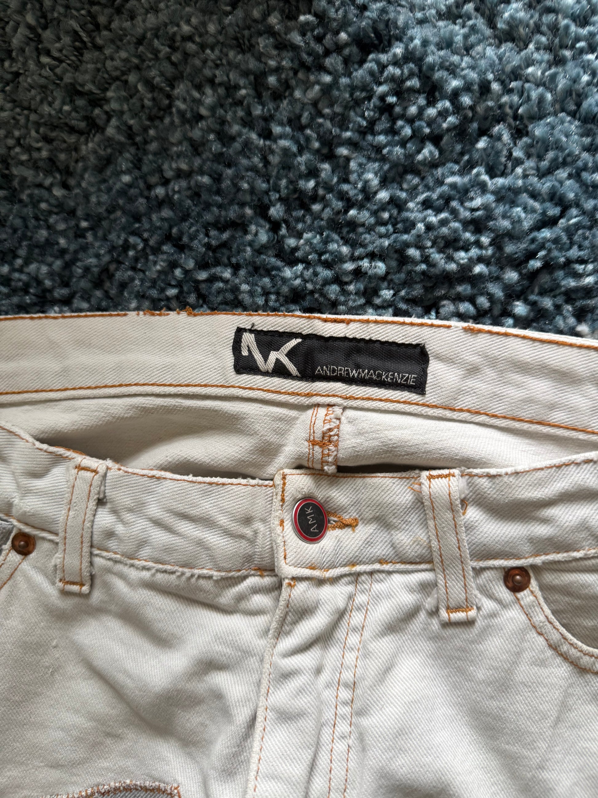 Andrew Mackenzie slashed sword knee blood pocket pants