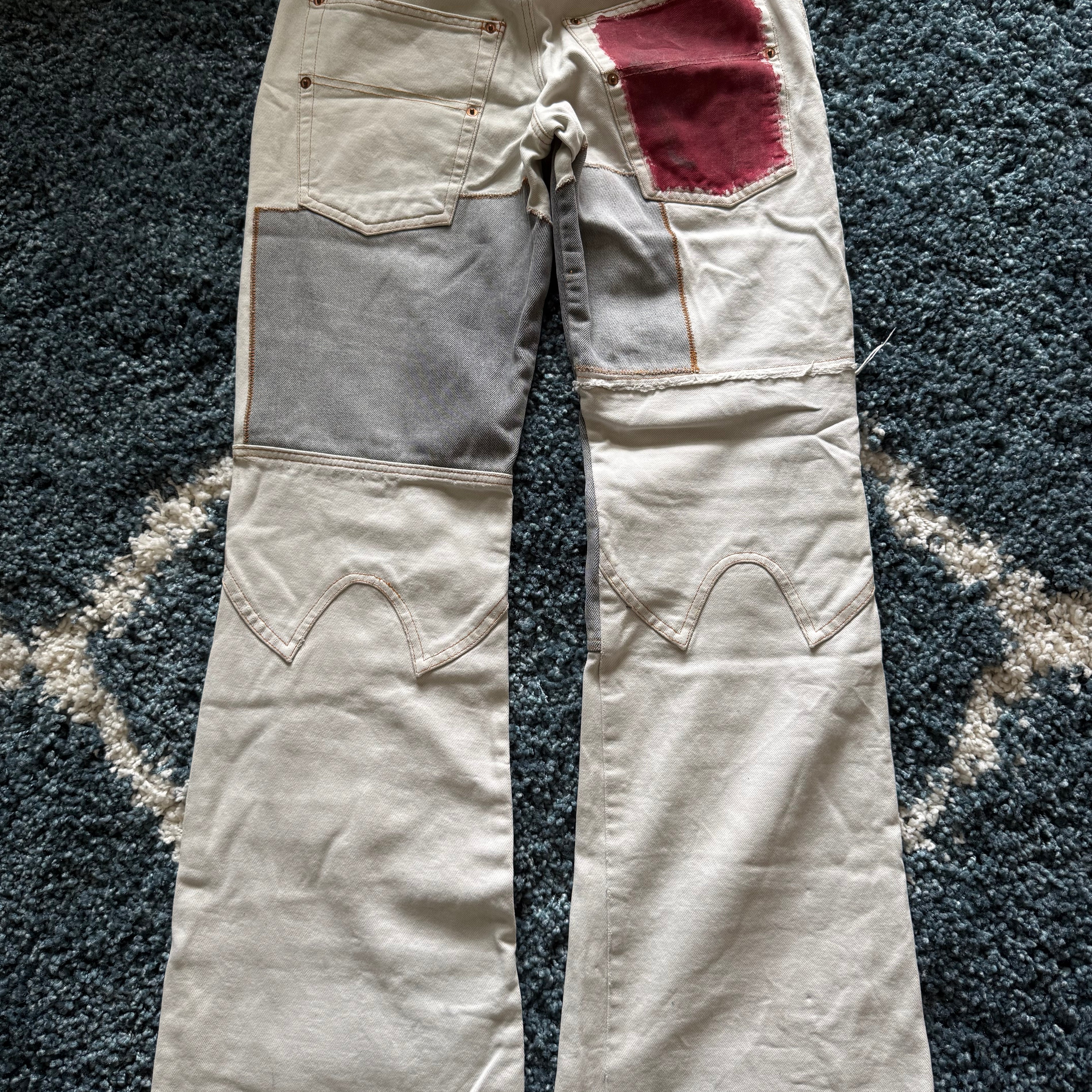 Andrew Mackenzie slashed sword knee blood pocket pants