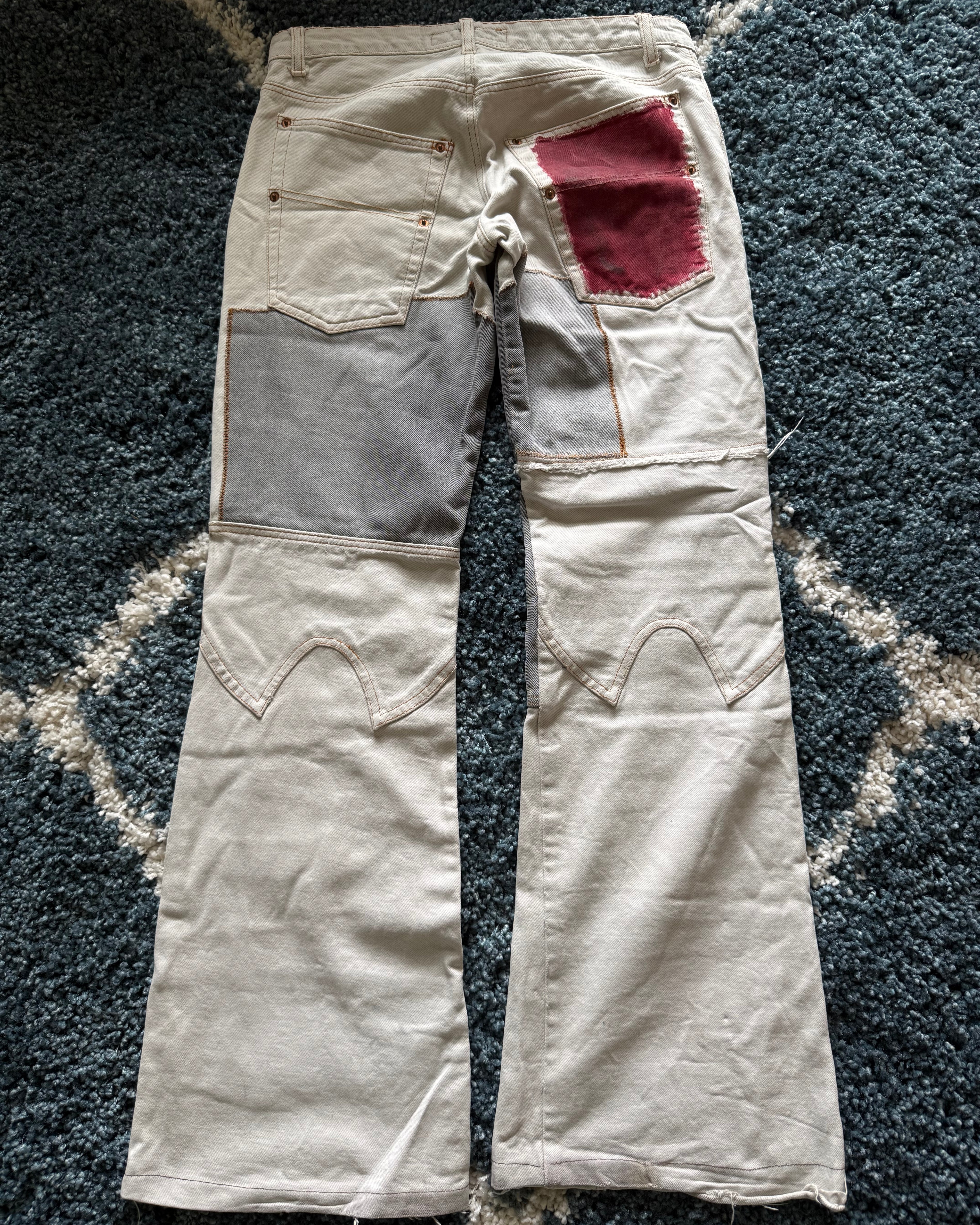 Andrew Mackenzie slashed sword knee blood pocket pants