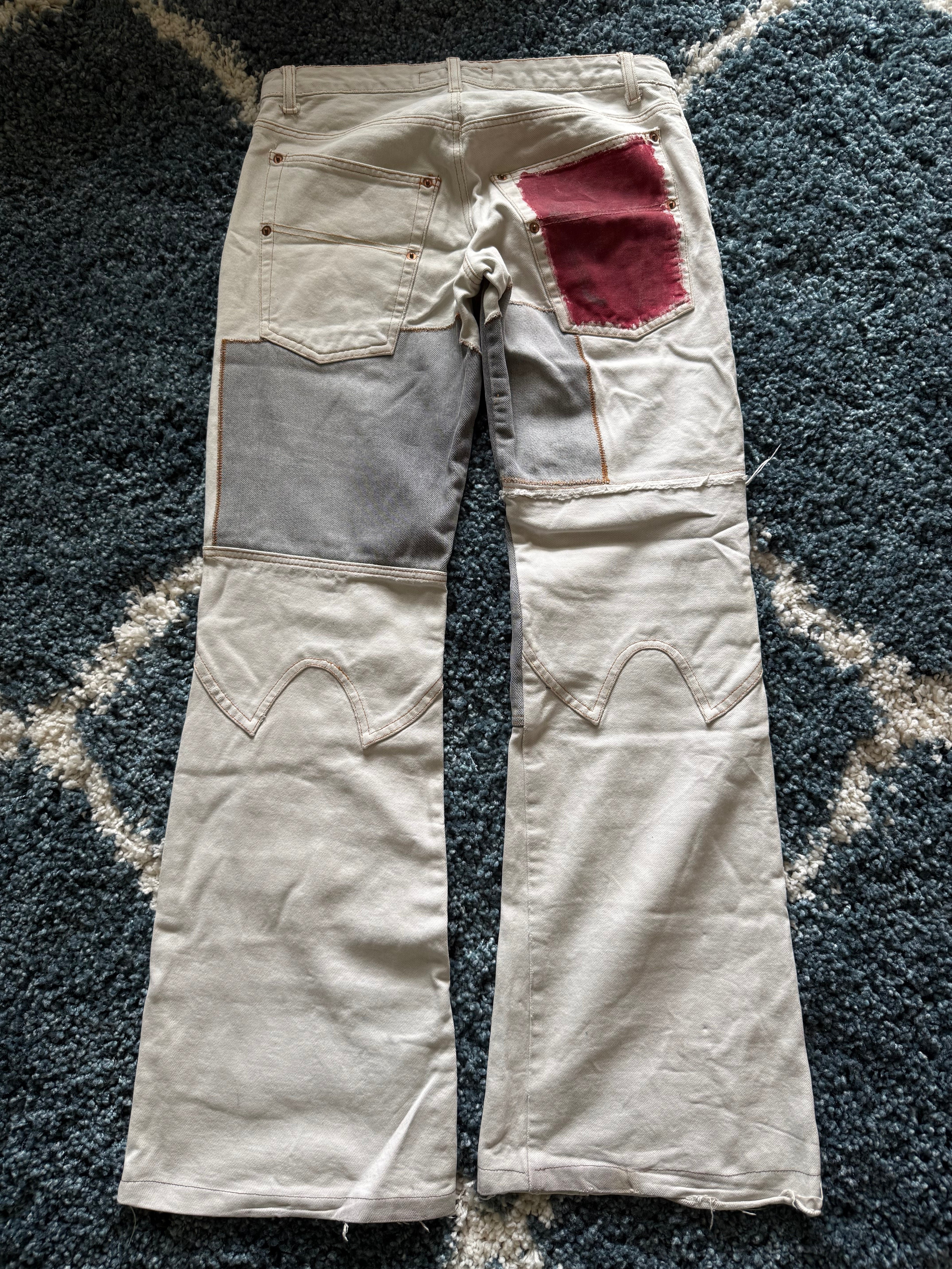 Andrew Mackenzie slashed sword knee blood pocket pants