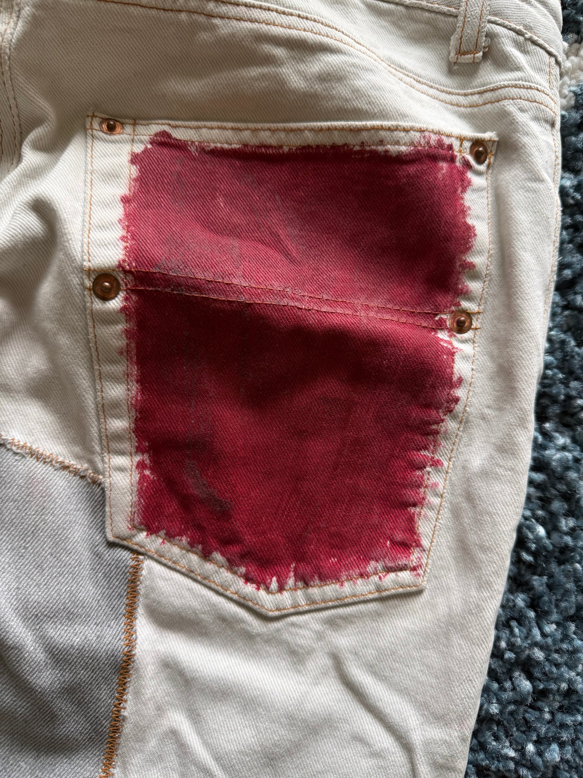 Andrew Mackenzie slashed sword knee blood pocket pants