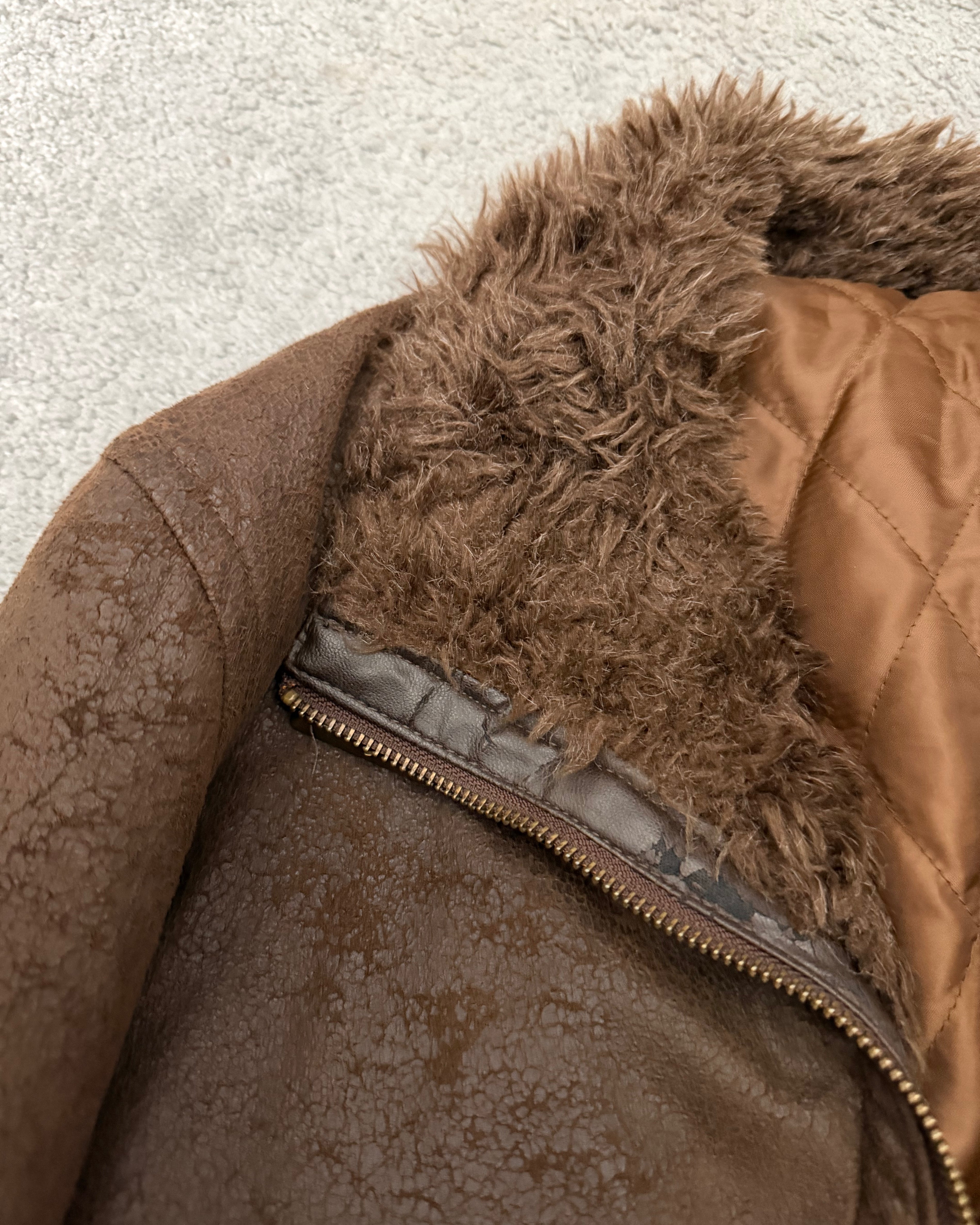 Tornado Mart 00‘s belted cracked waxed fur jacket