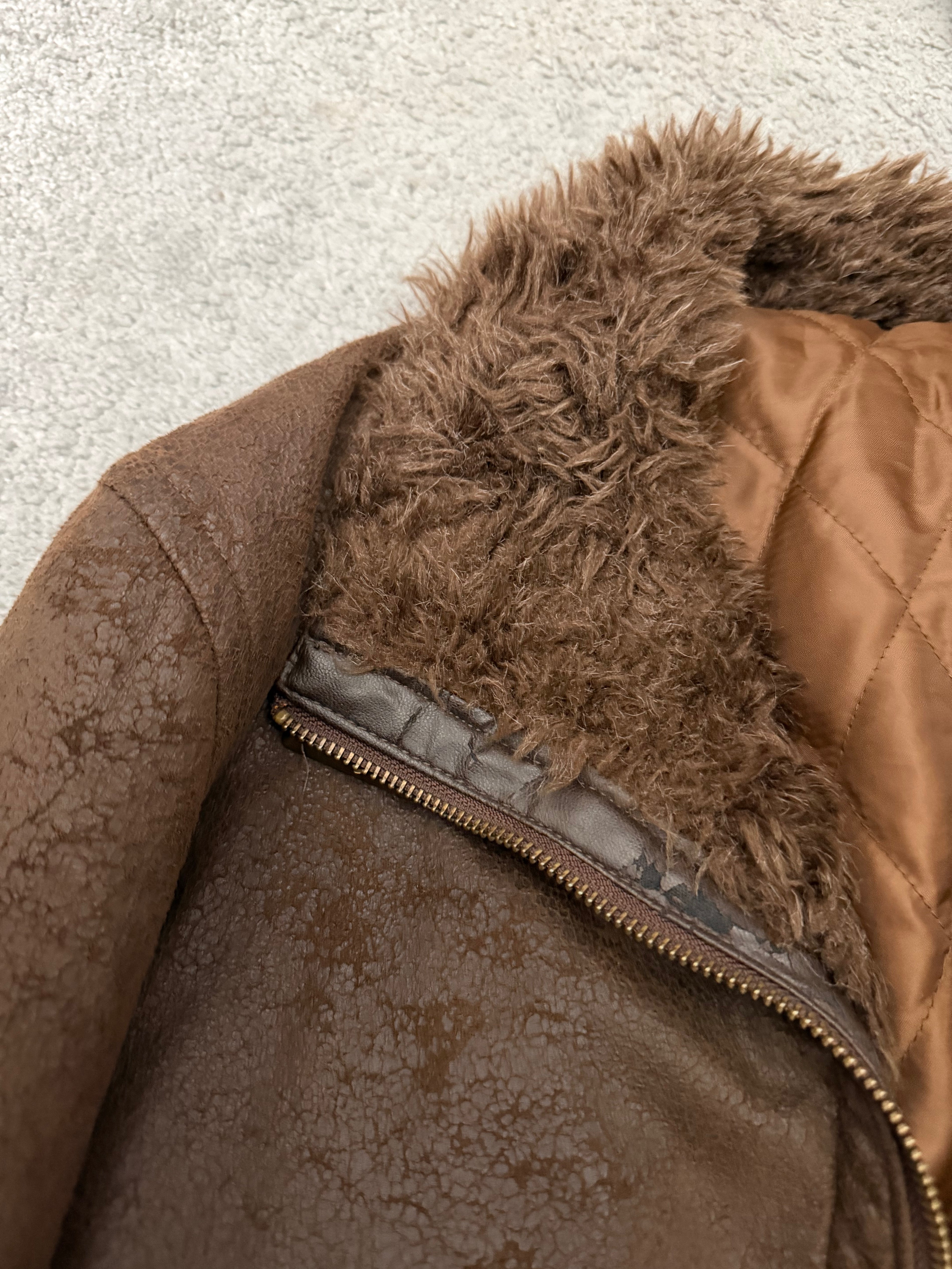 Tornado Mart 00‘s belted cracked waxed fur jacket