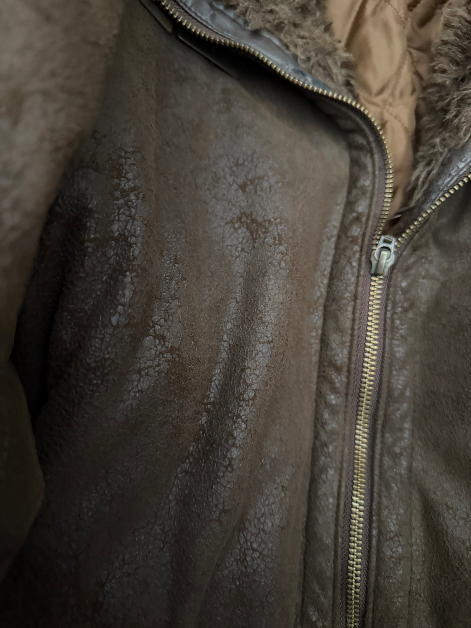 Tornado Mart 00‘s belted cracked waxed fur jacket