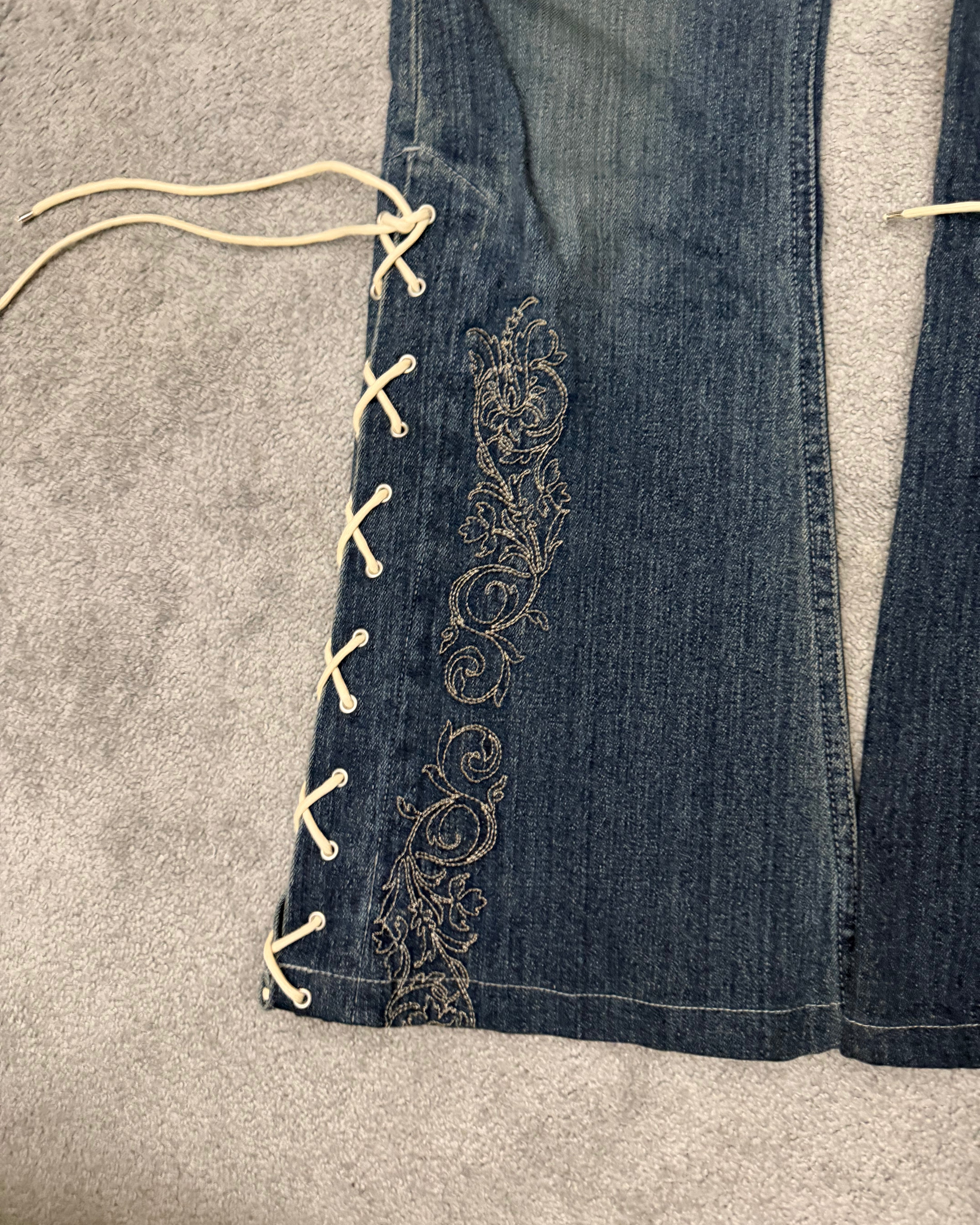 Tornado Mart Laced Up Tribal Flared Denim Pants
