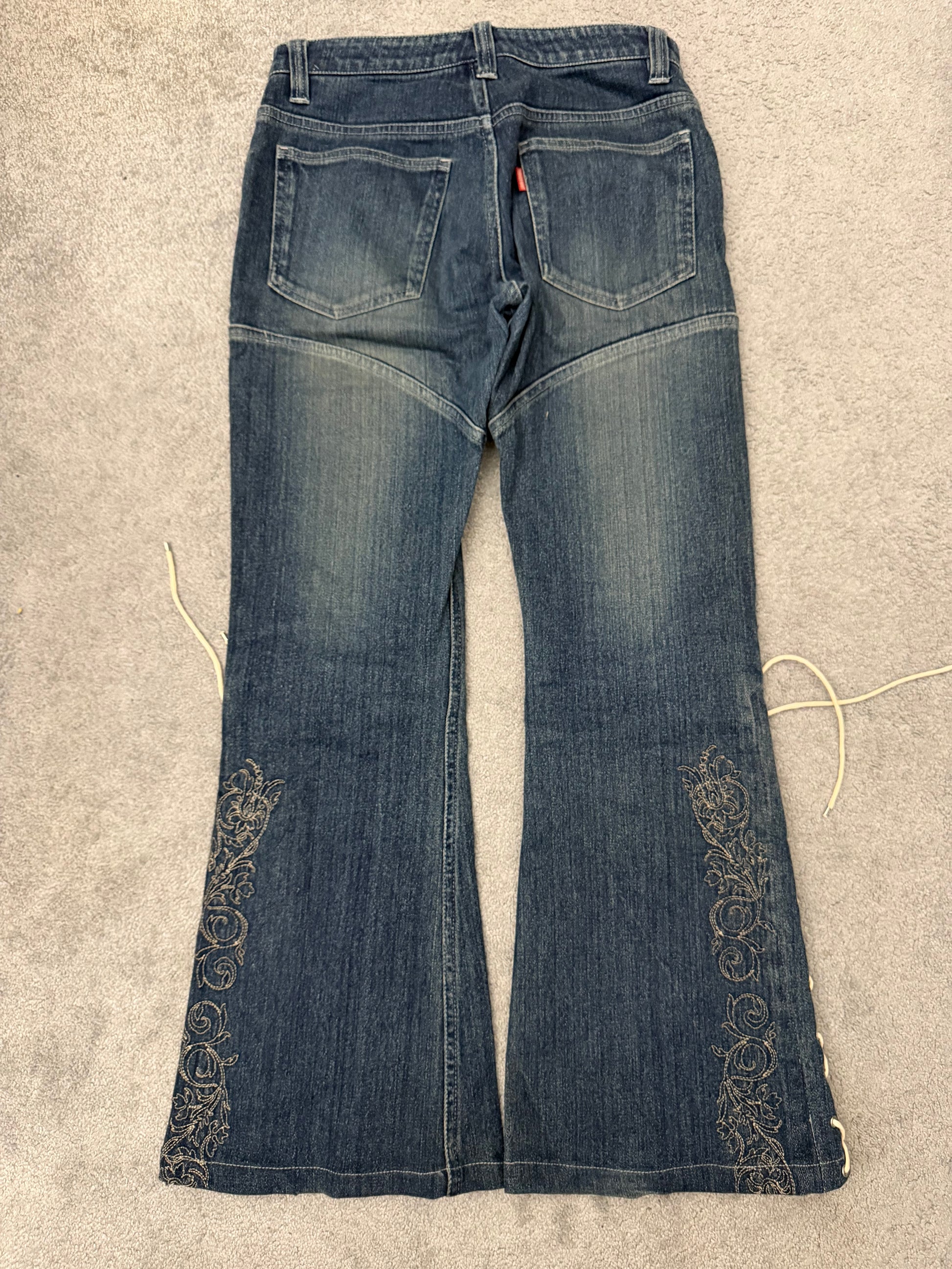 Tornado Mart Laced Up Tribal Flared Denim Pants