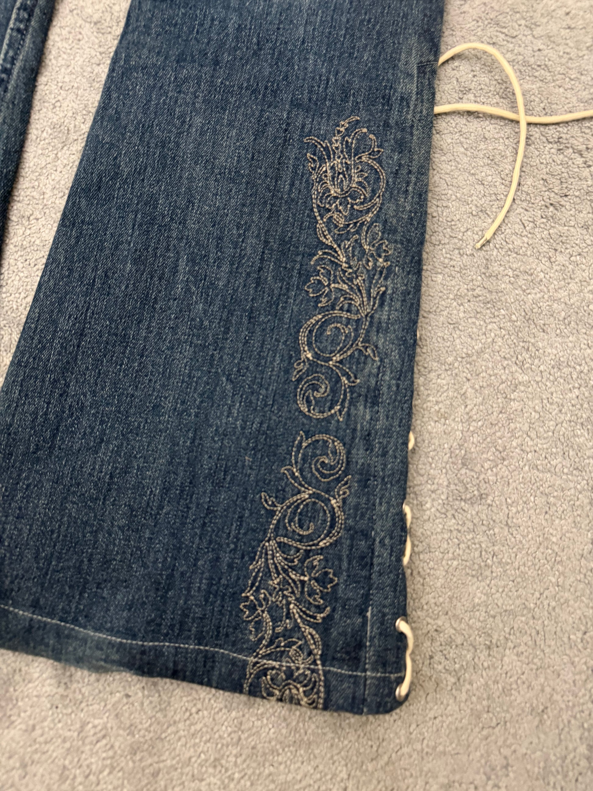 Tornado Mart Laced Up Tribal Flared Denim Pants