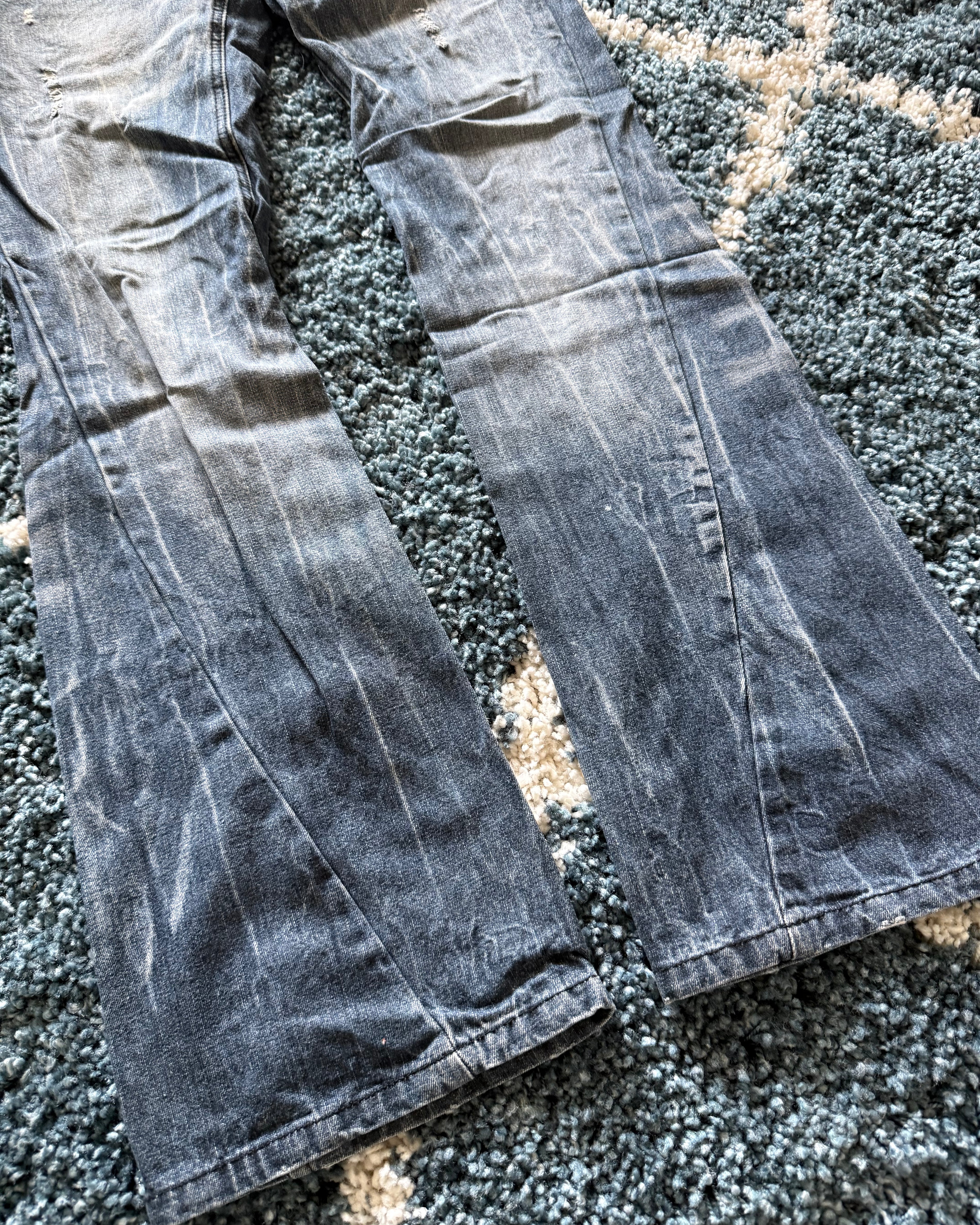 Black Baccara spiral distressed flared denim