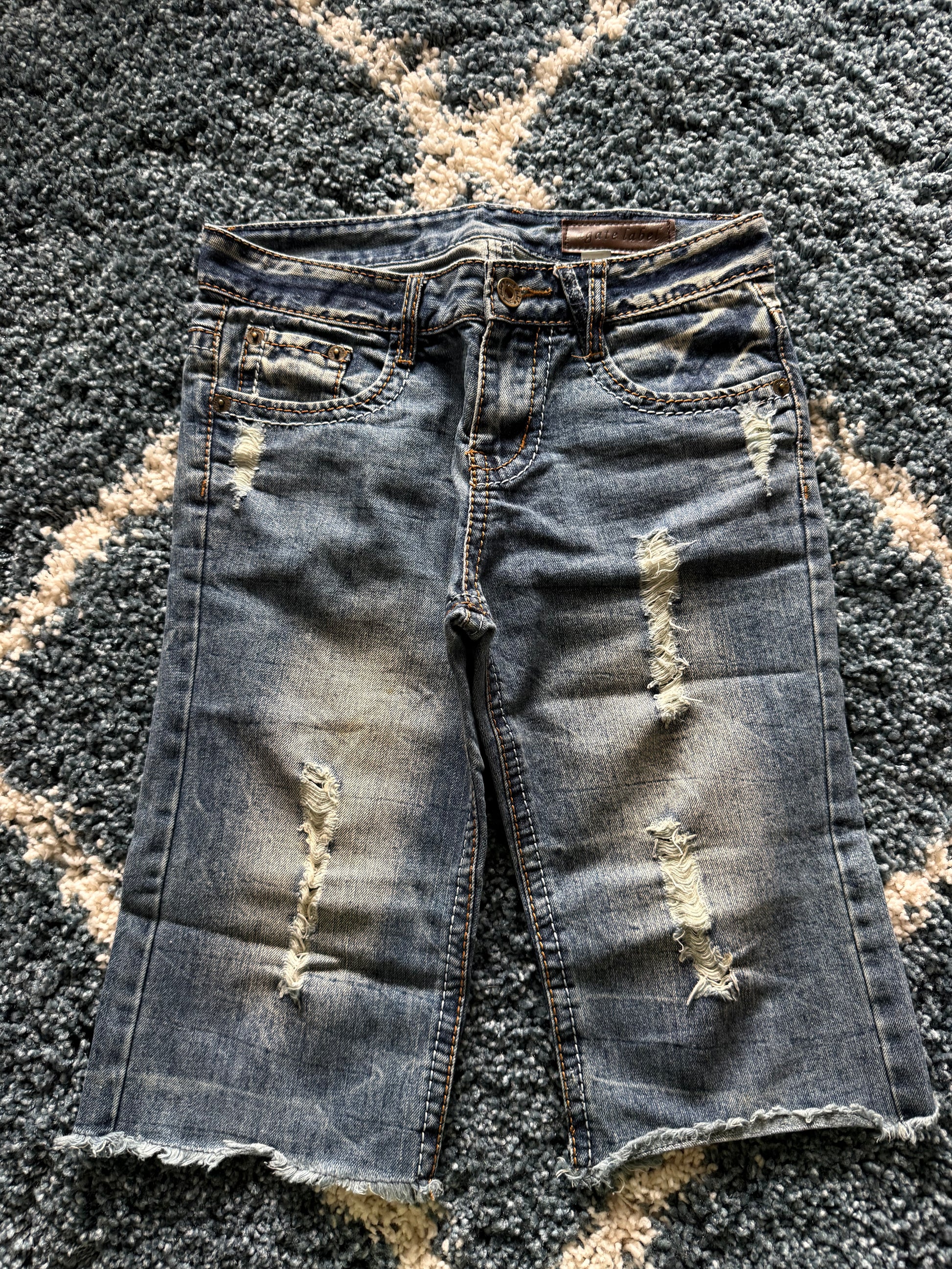 Agathe distressed wing shorts