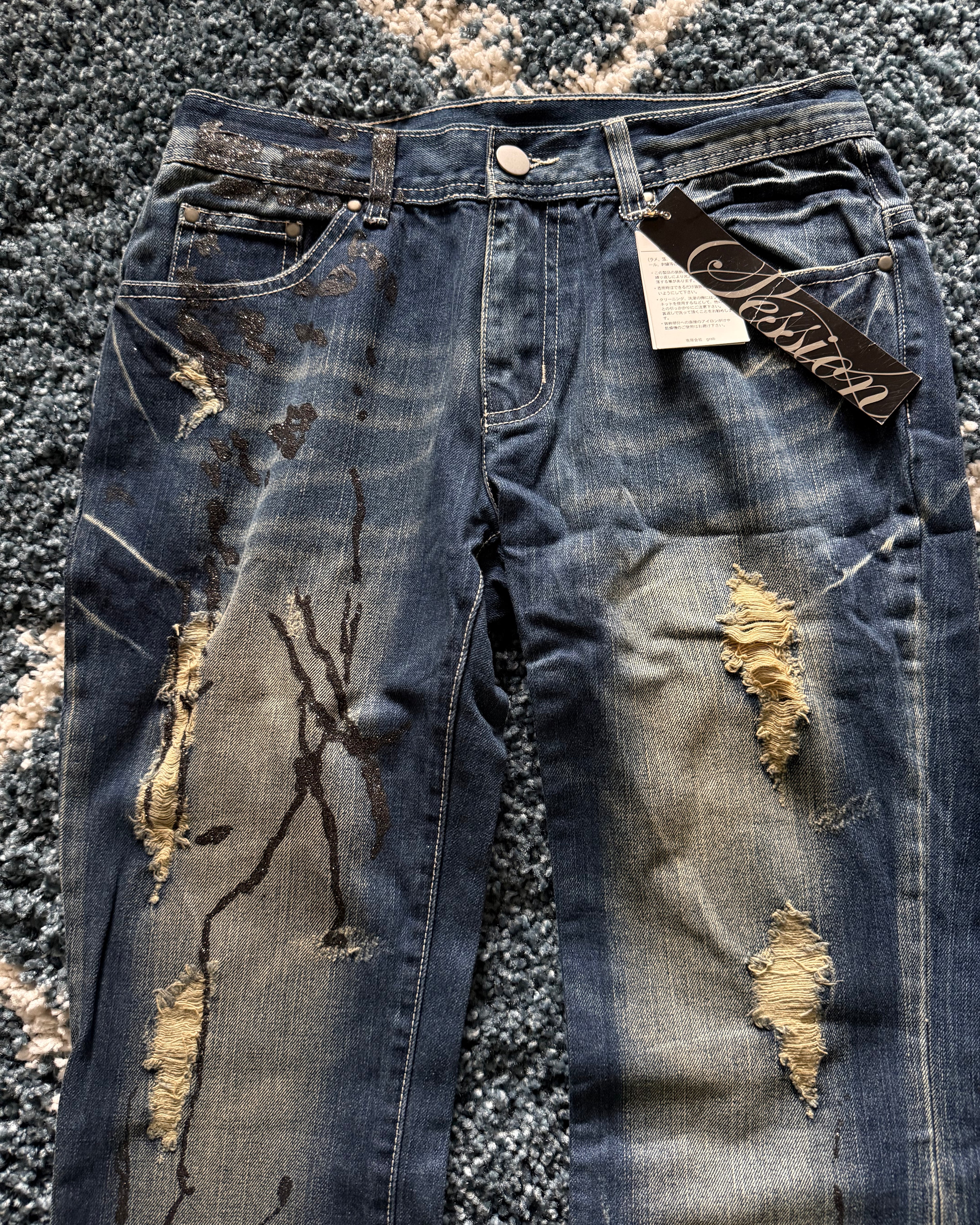 Nelson splattered glitter distressed flared jeans