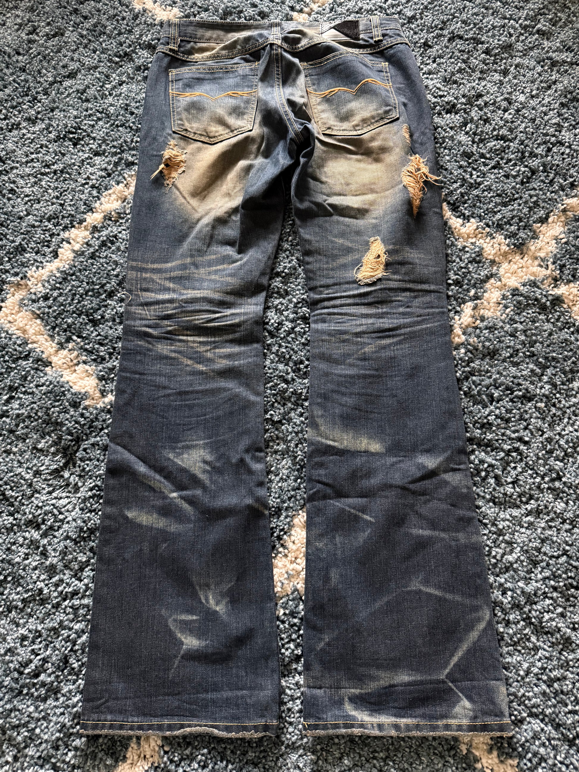 FUGA crashed distressed ponyhair&snakeskin patch flared denim